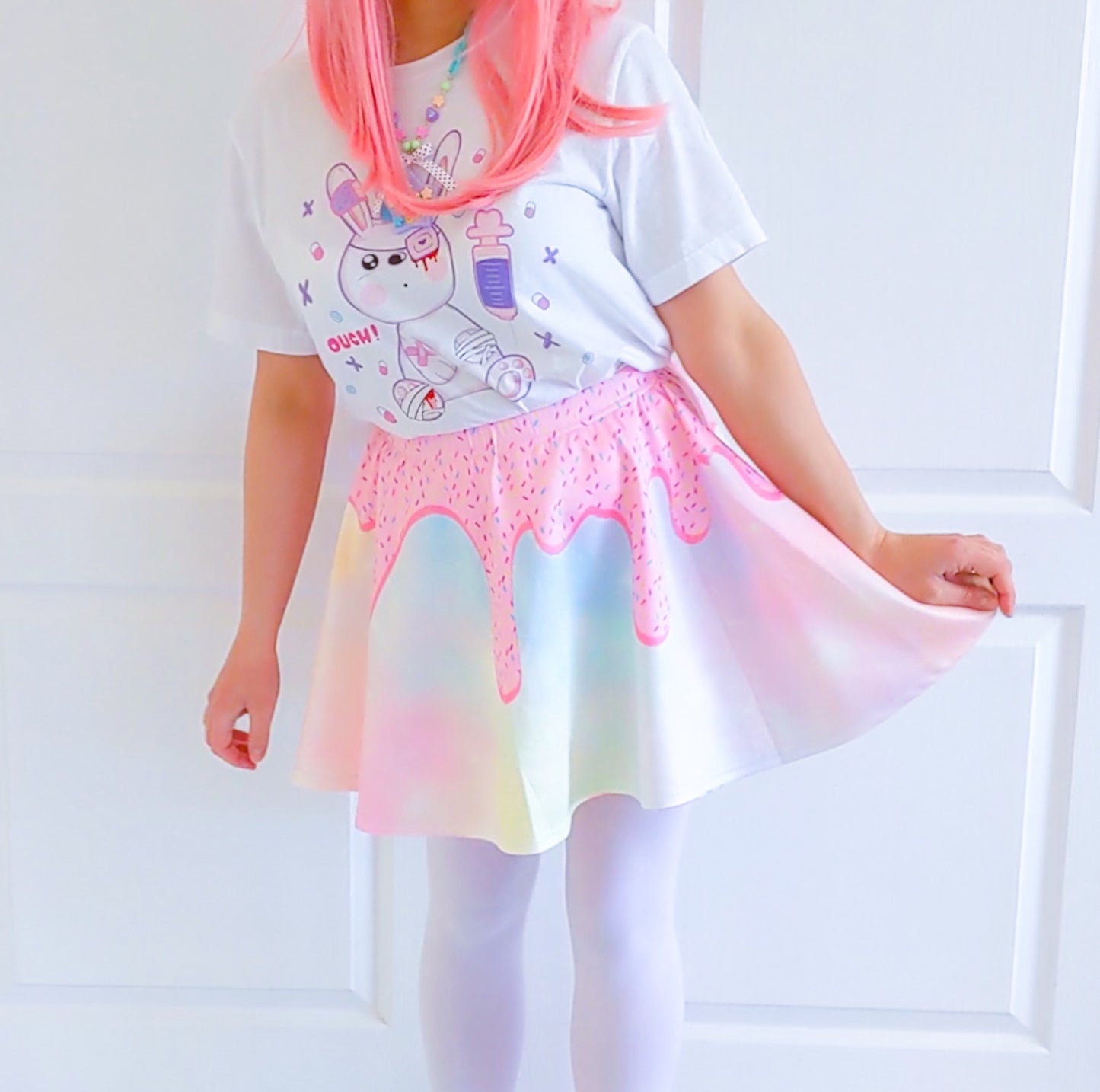 Happy girl dressed in a kawaii Donuts Sugar skater skirt styled