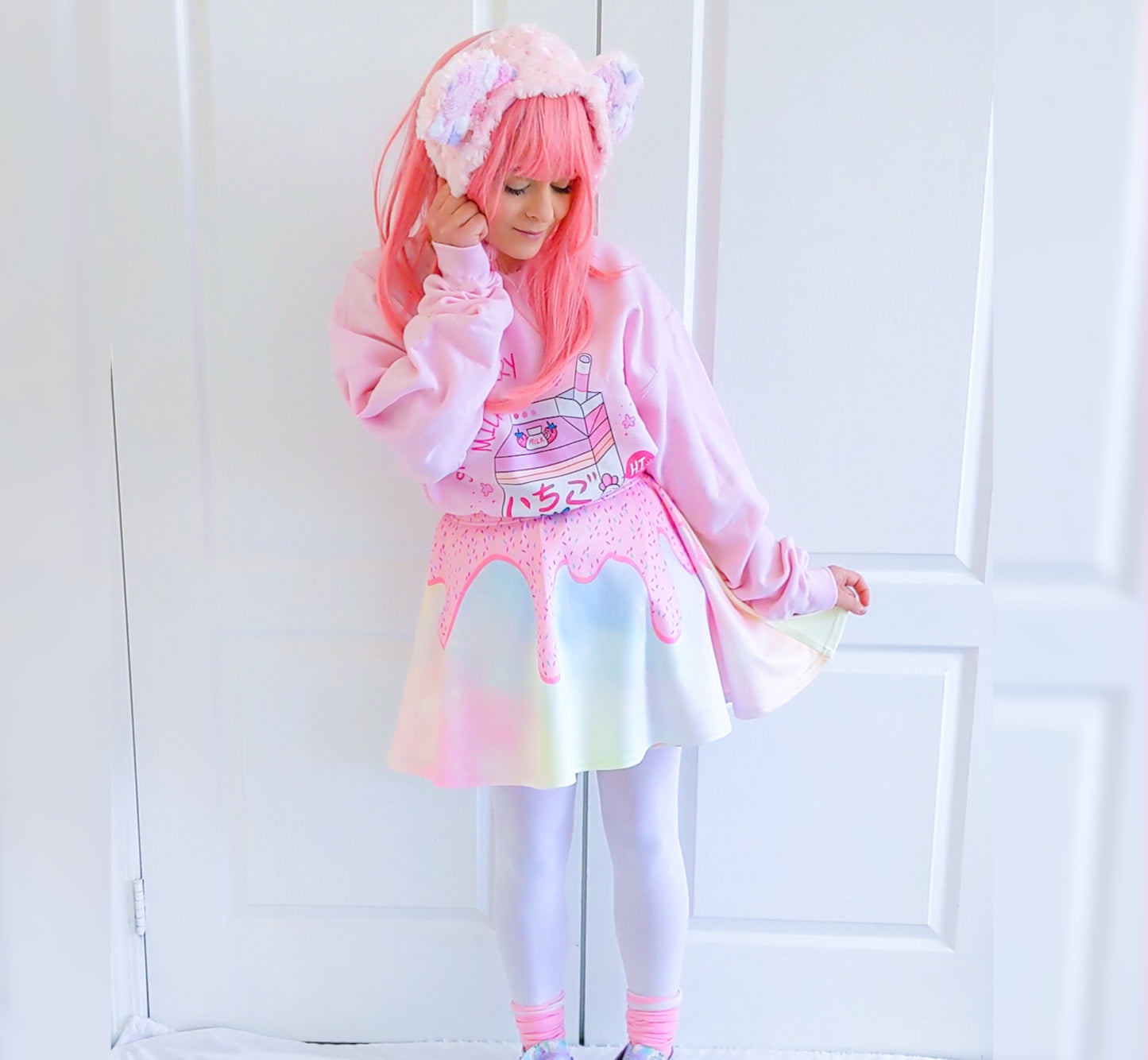 Happy girl dressed in a kawaii Donuts Sugar skater skirt styled