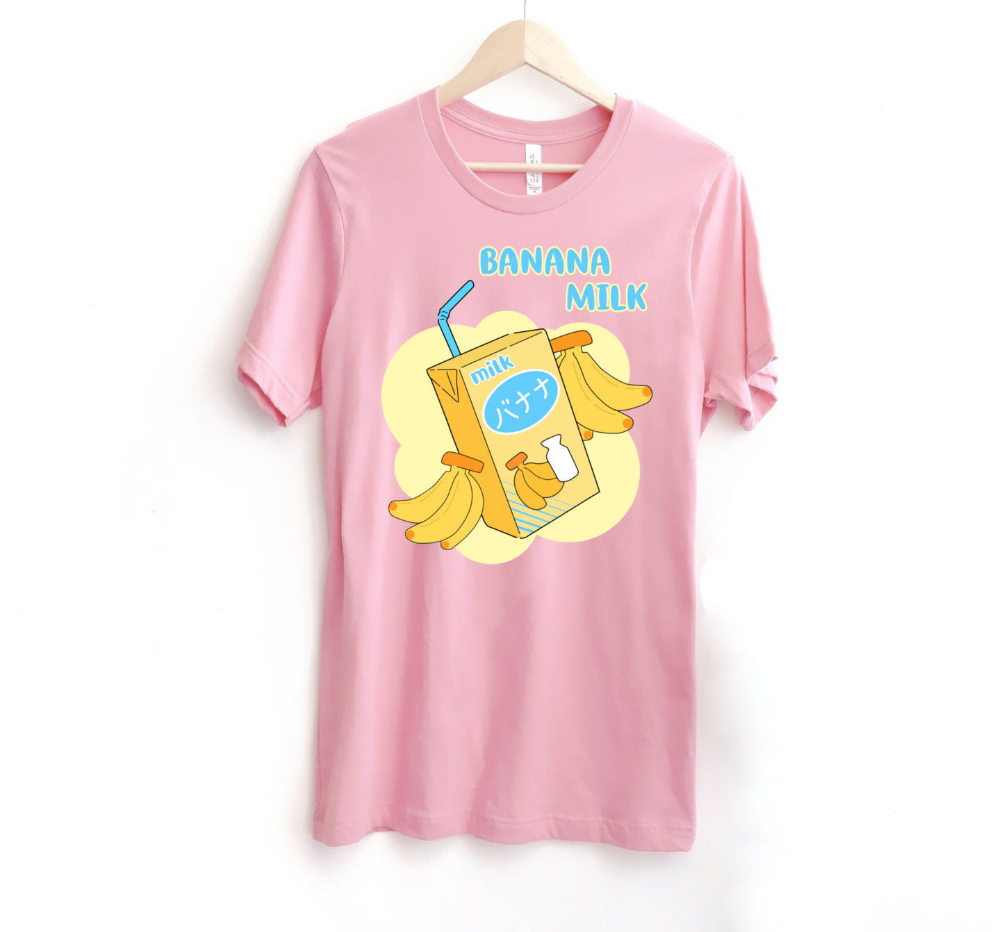 kawaii t-shirt with banana milk print on white background.