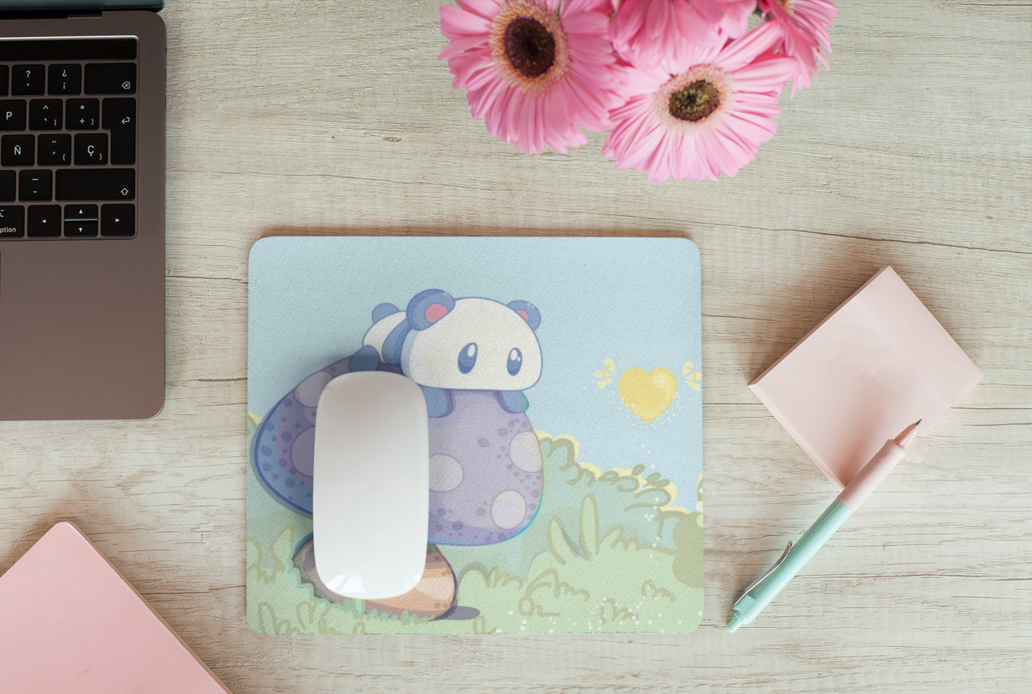 Soft kawaii desk mat with adorable animal design on a tidy workspace