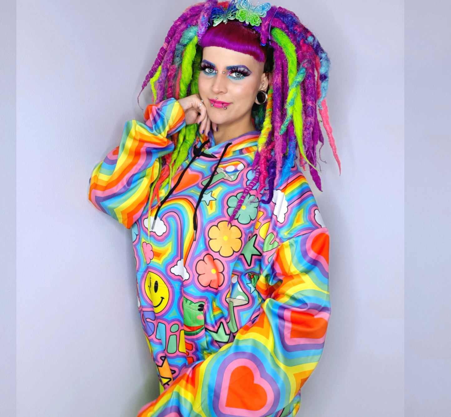 Model wearing a Harajuku Kidcore sweatshirt hoodie with trippy print