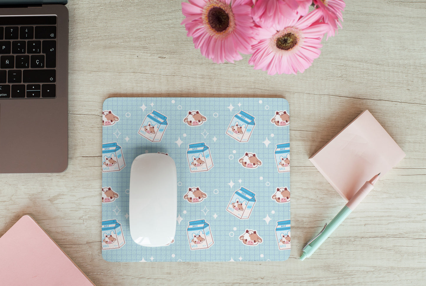 Soft kawaii desk mat with adorable animal design on a tidy workspace