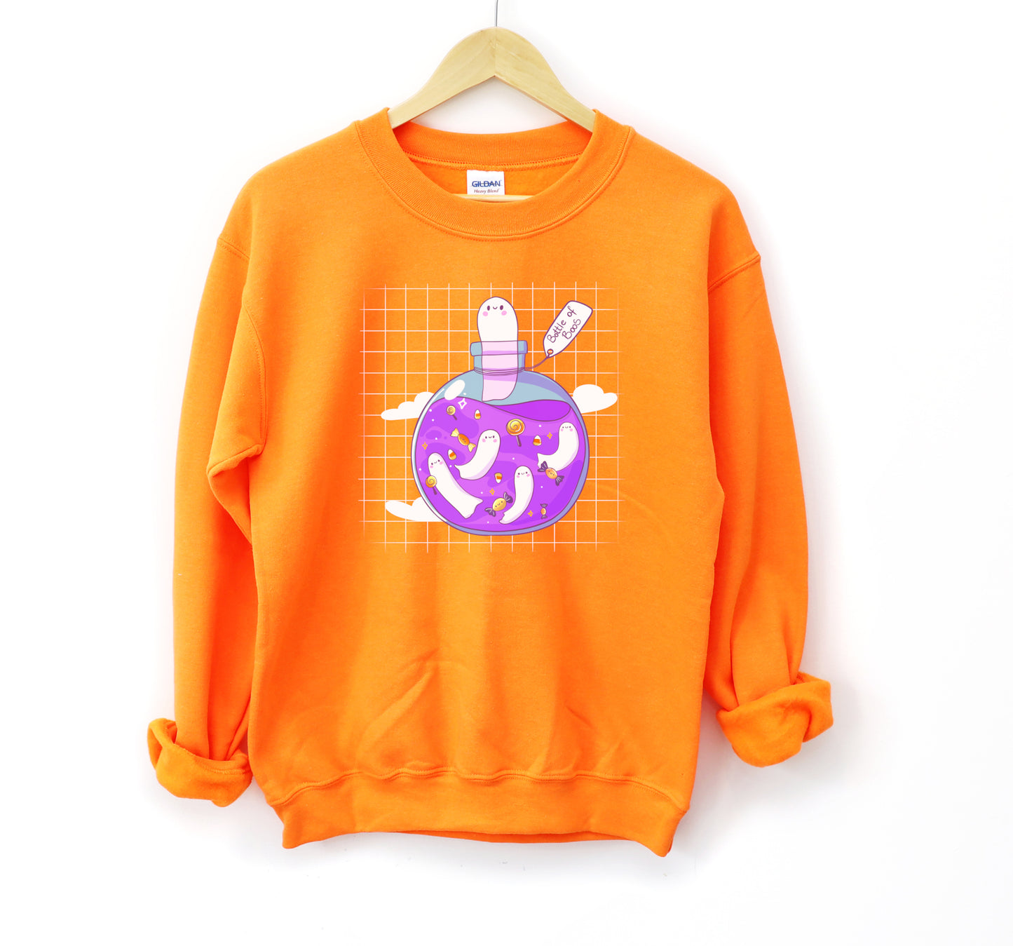 Kawaii Halloween sweatshirt with Halloween-themed graphics of a bottle of boos on a white background.