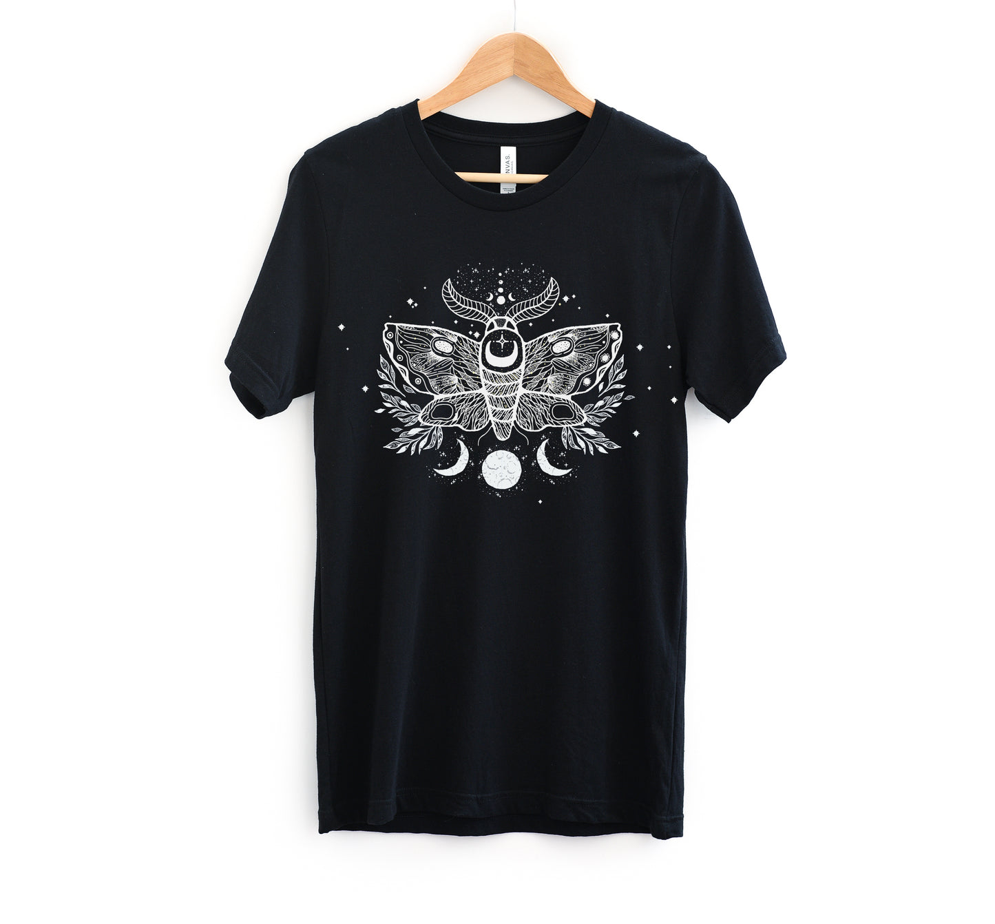 goth t-shirt with moth and moon print on white background.