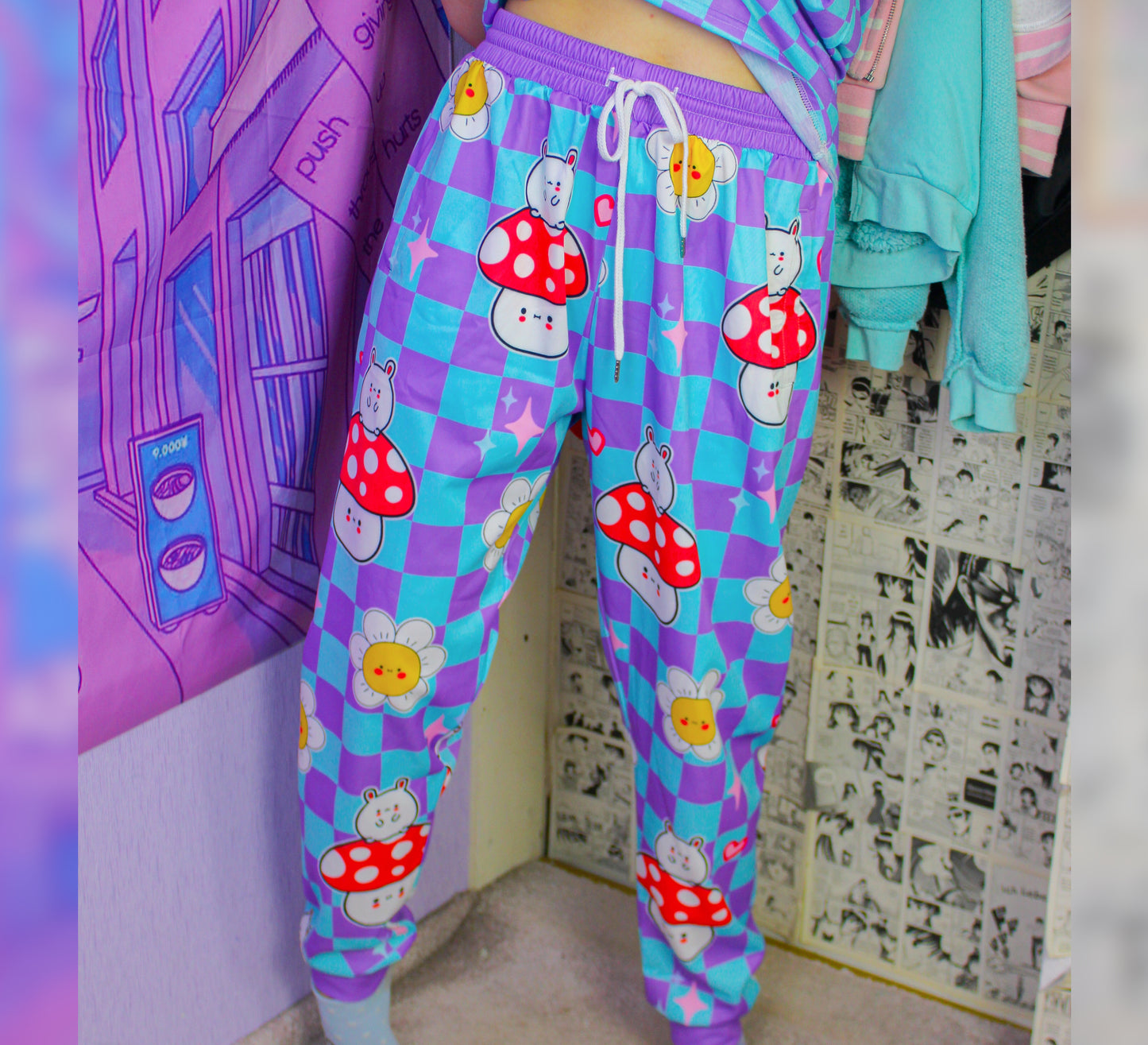 Model dressed in colorful Decora Kei and Kidcore fashion with vibrant pants.