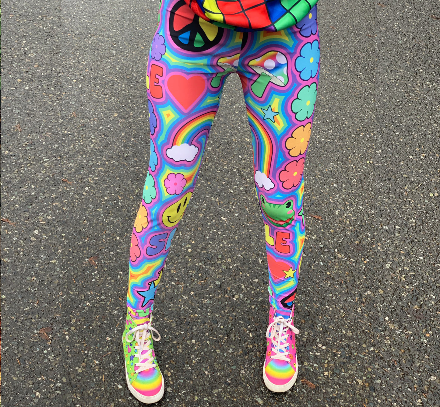 Model dressed in colorful Decora Kei and Kidcore fashion with vibrant pants.