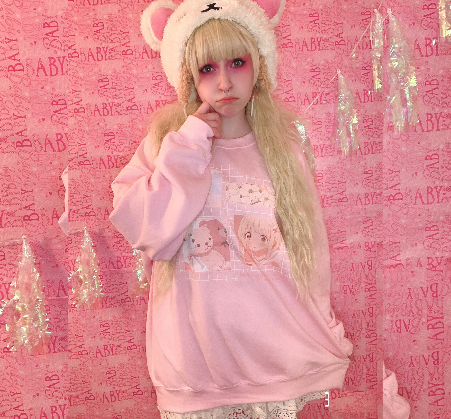 Youthful model wearing a Kawaii Aesthetic Anime pink babygirl sweatshirt