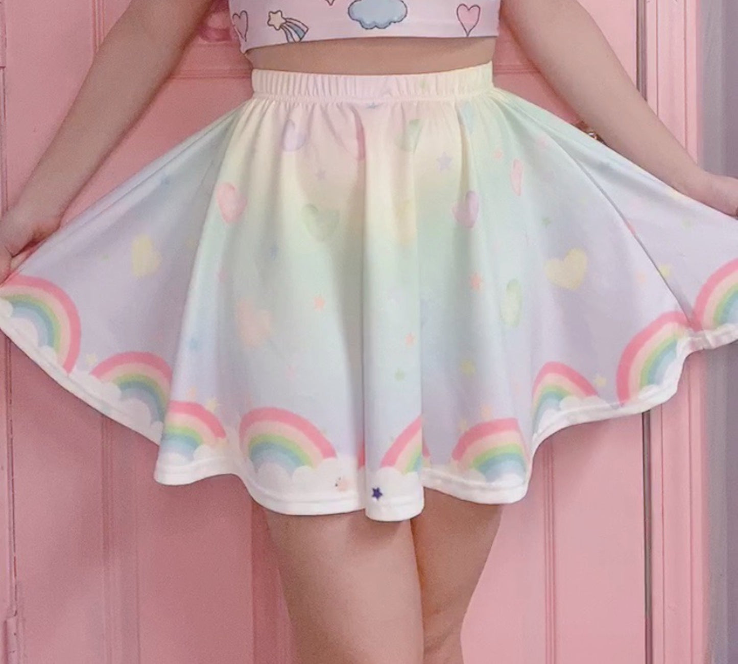 model wearing a cute fairy kei kawaii skirt pastel rainbow skirt