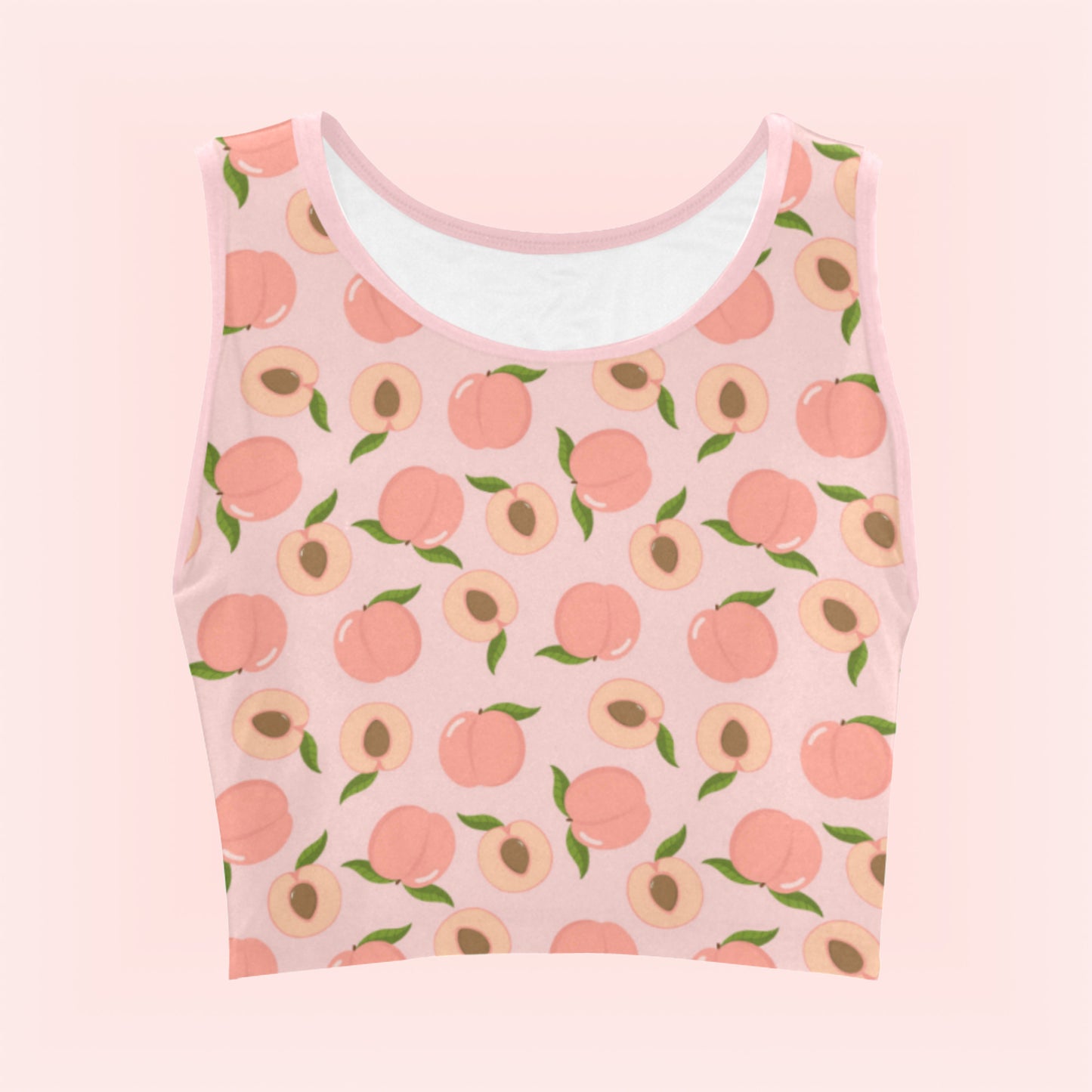 peach pink croptop displayed on coloured background