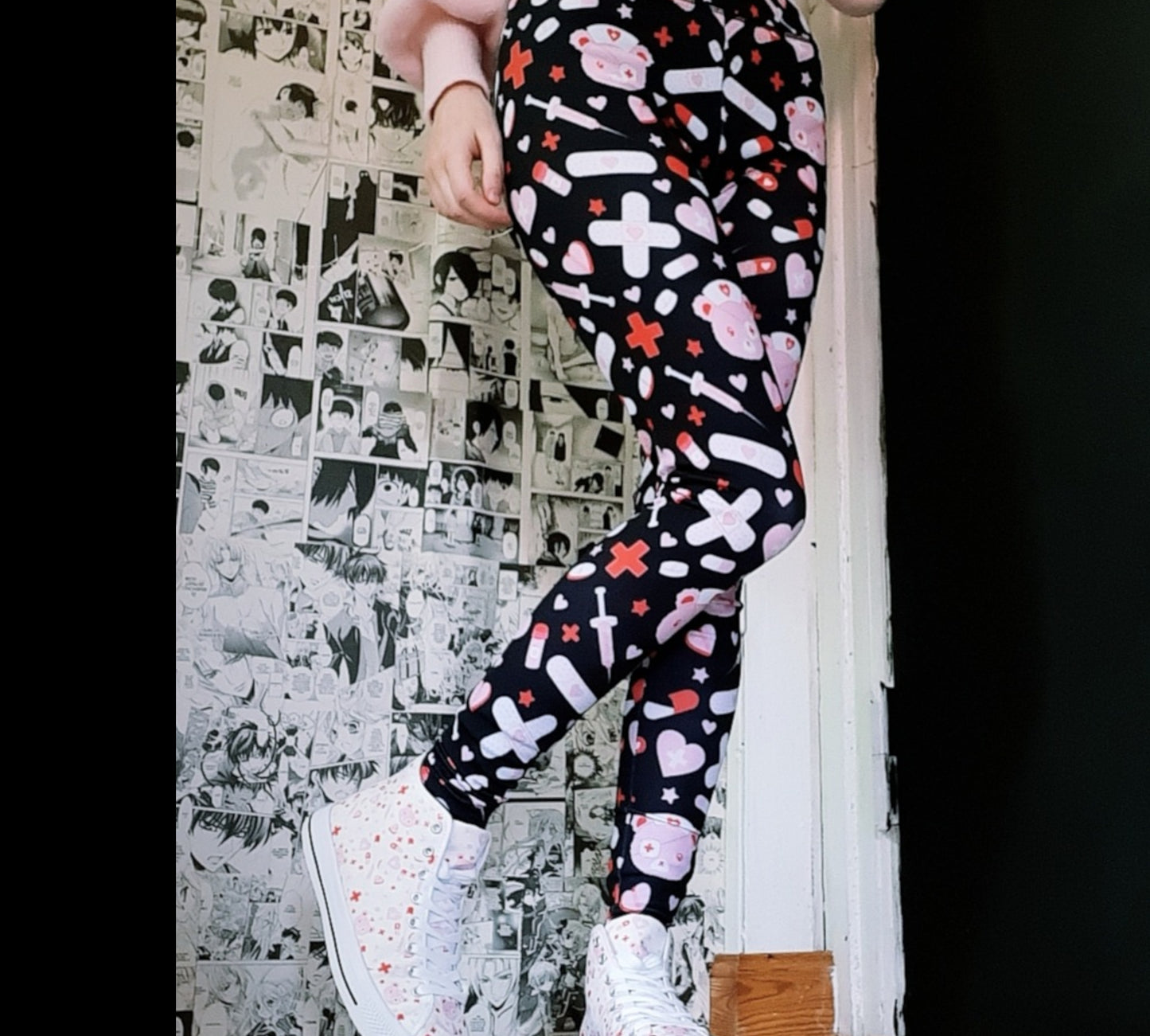 Young girl wearing Kawaii Menhera Clothes Leggings with creepy cute design