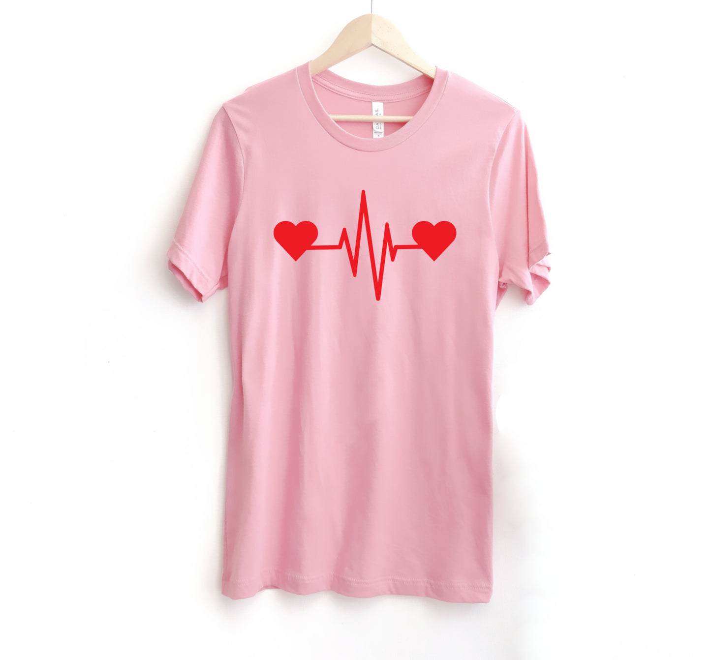 Kawaii_Menhera Kei Cute Cardio Pink T-shirt displayed on clean white background.