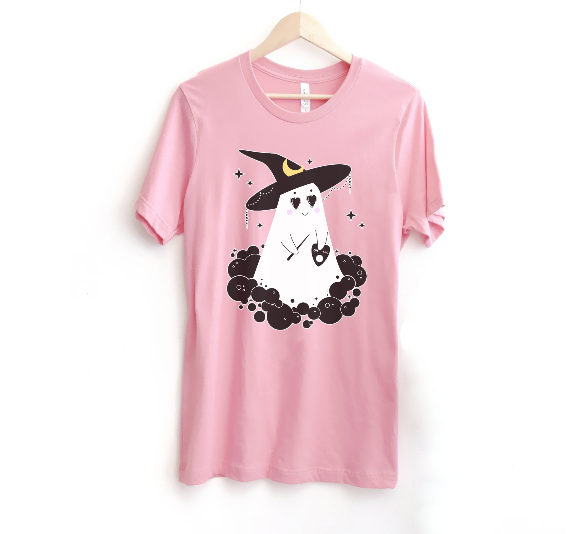Cute Halloween ghost pink shirt displayed on clean white background.