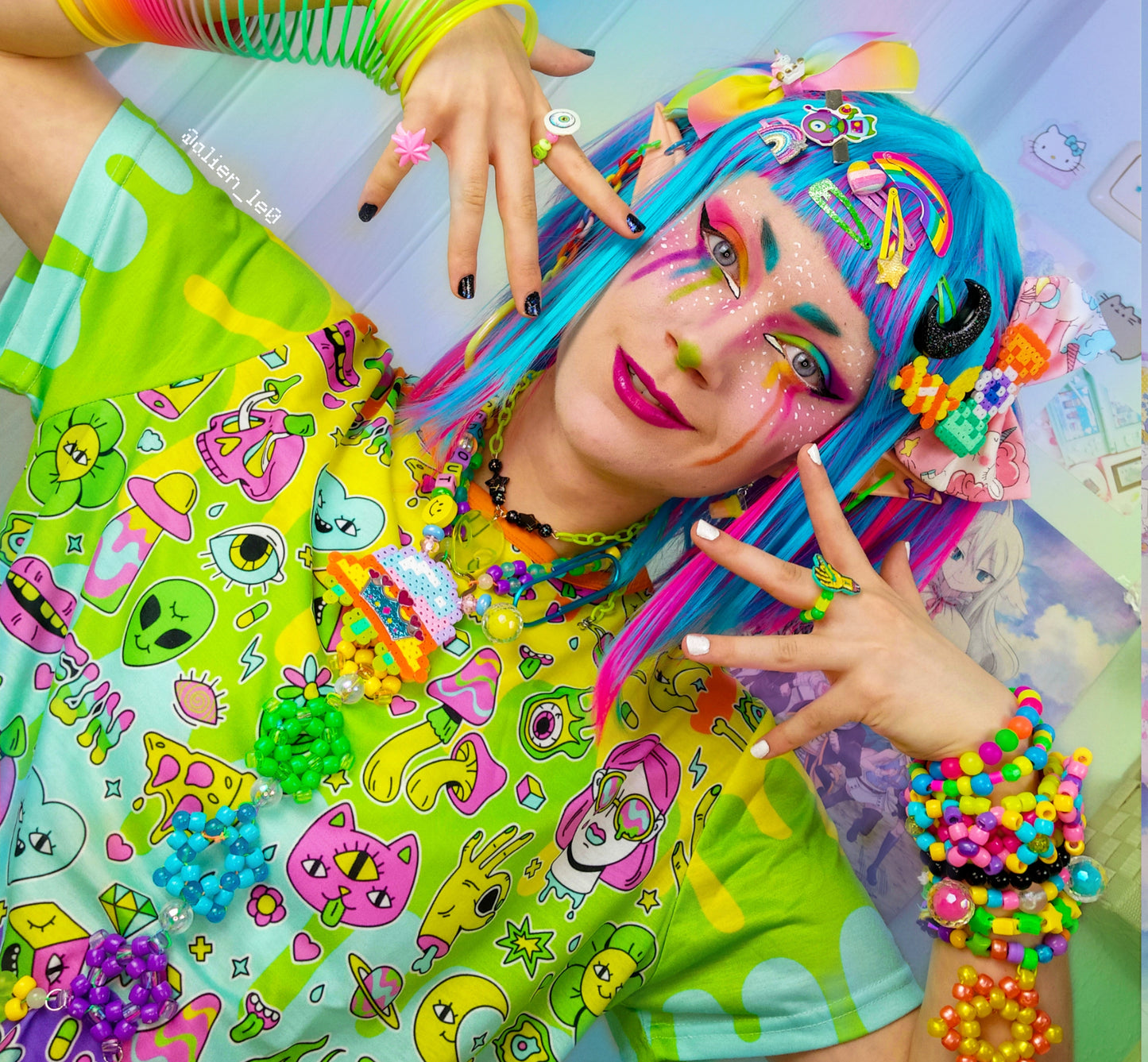 Young boy wearing a Harajuku Kidcore t-shirt with a rainbow print
