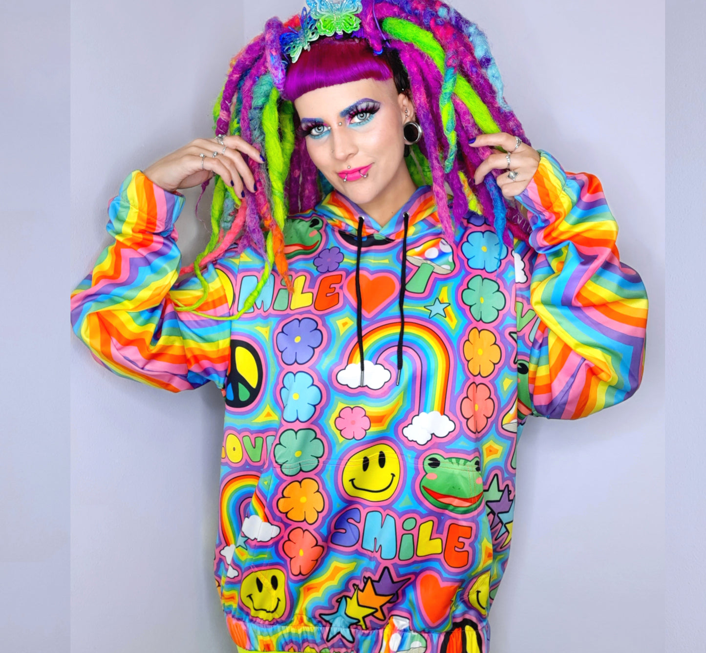 Model wearing a Harajuku Kidcore sweatshirt hoodie with trippy print