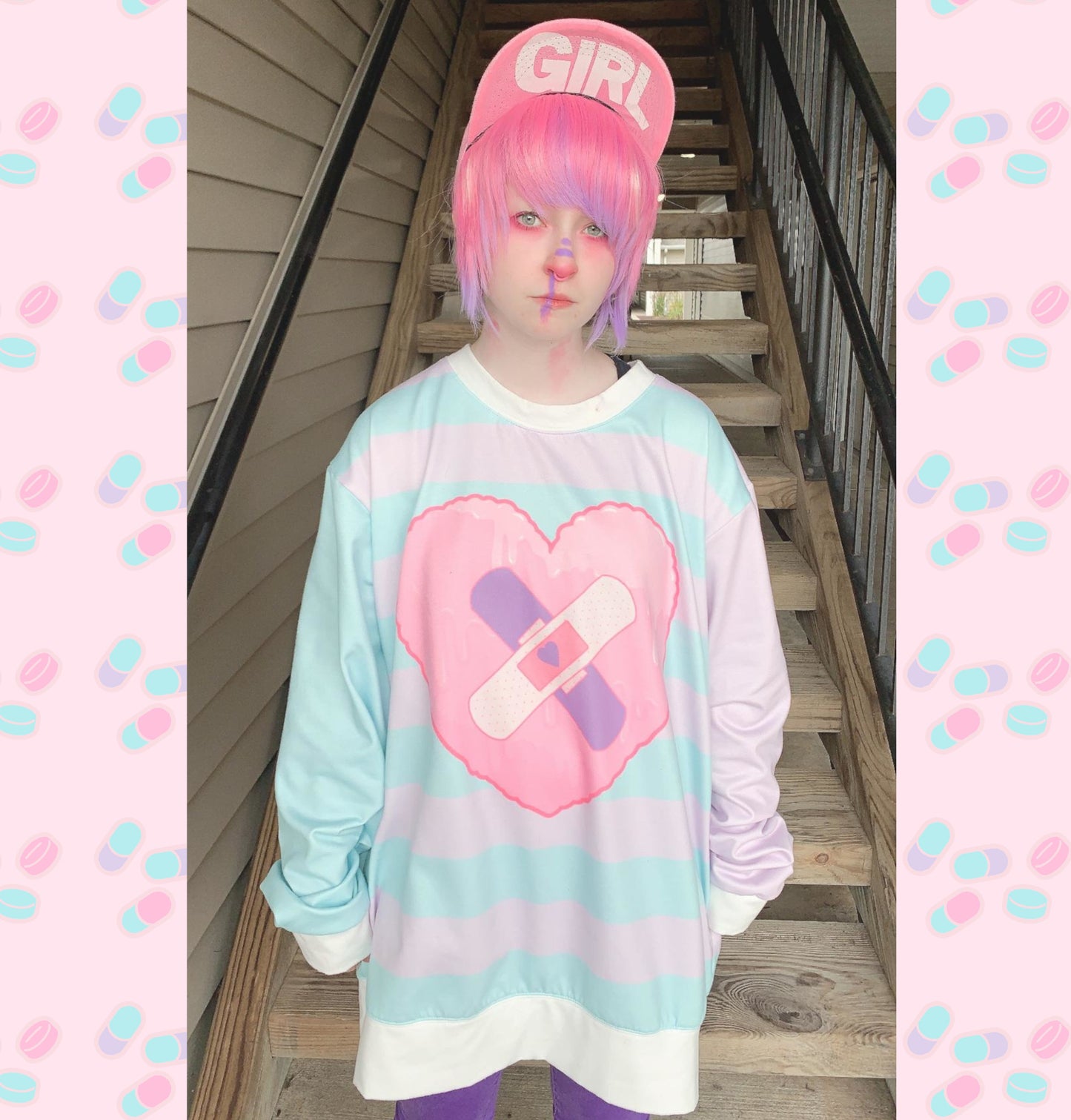 Young girl wearing a pastel kawaii sweatshirt with a cute and creepy print