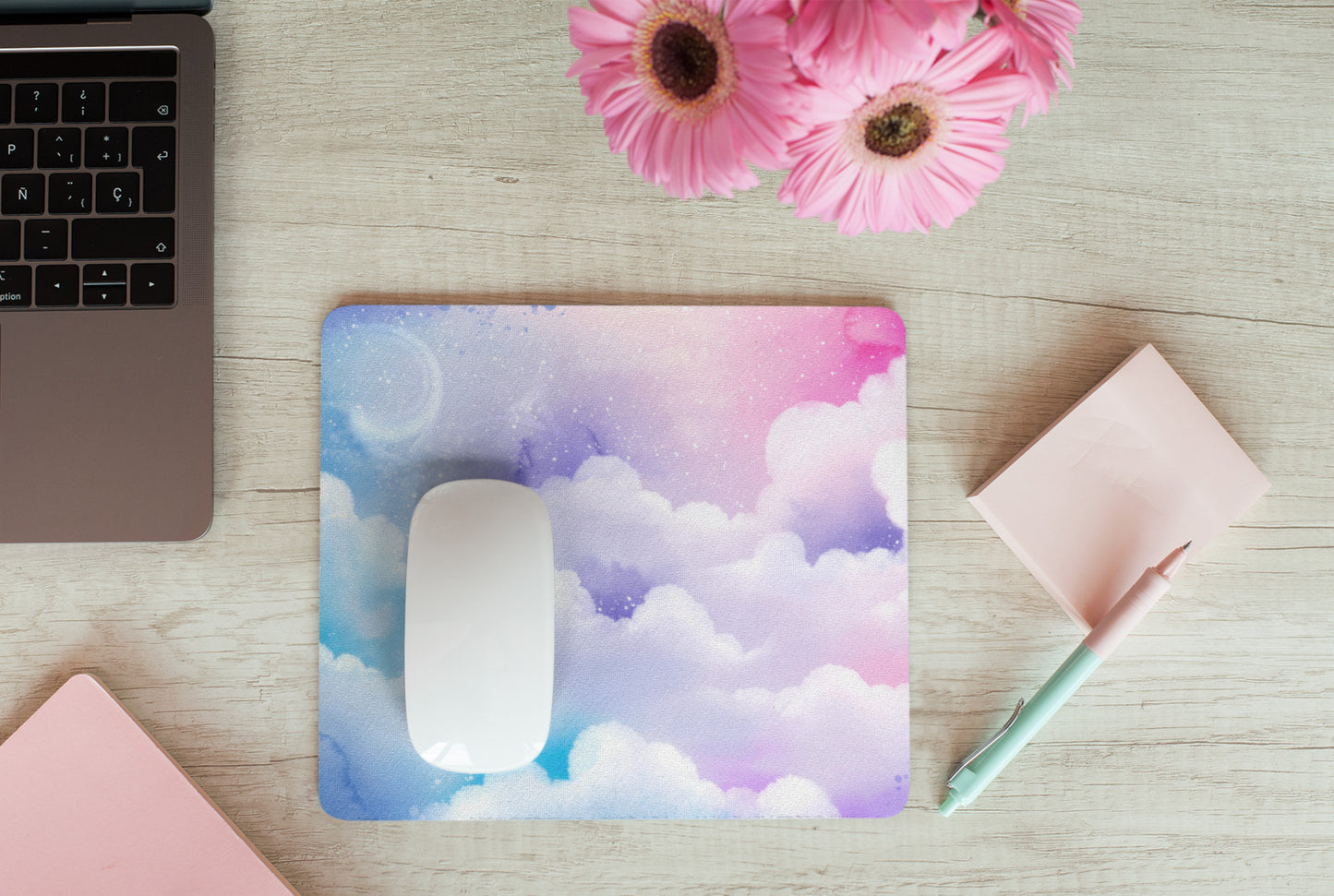 Pastel kawaii desk mat with charming motifs and cozy aesthetic on a oak desk