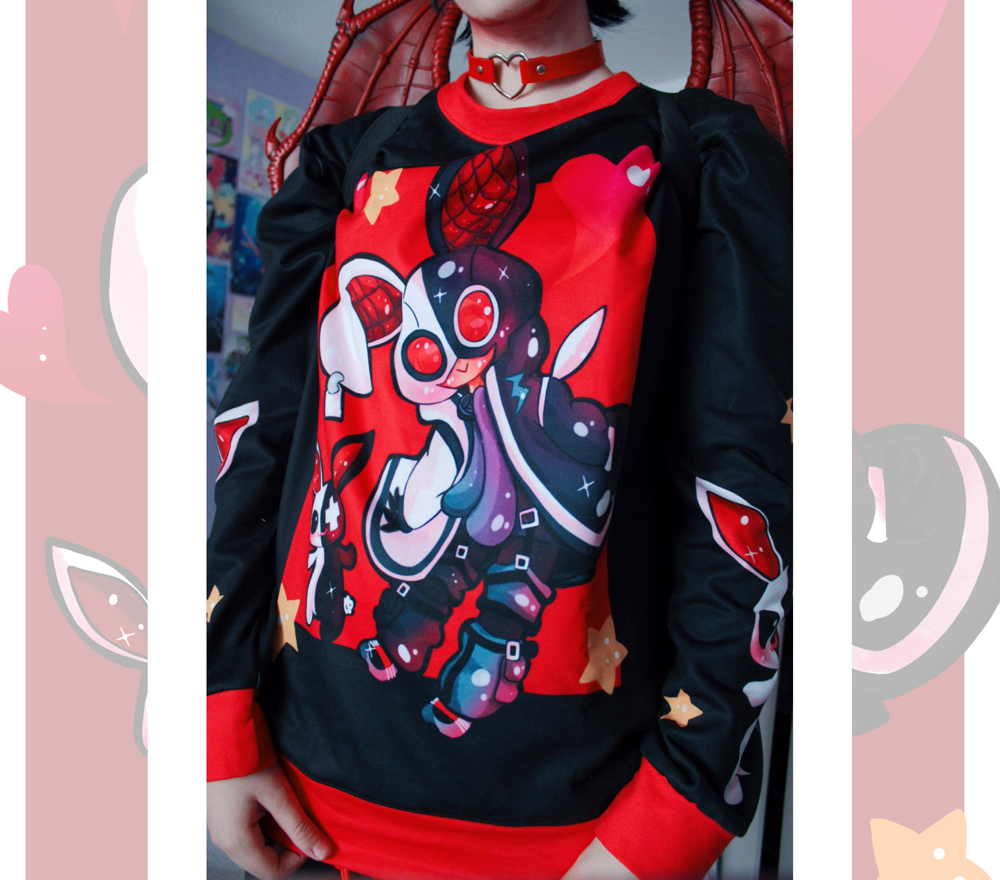 Front of a red and black pastel goth sweatshirt displayed on colourful background.