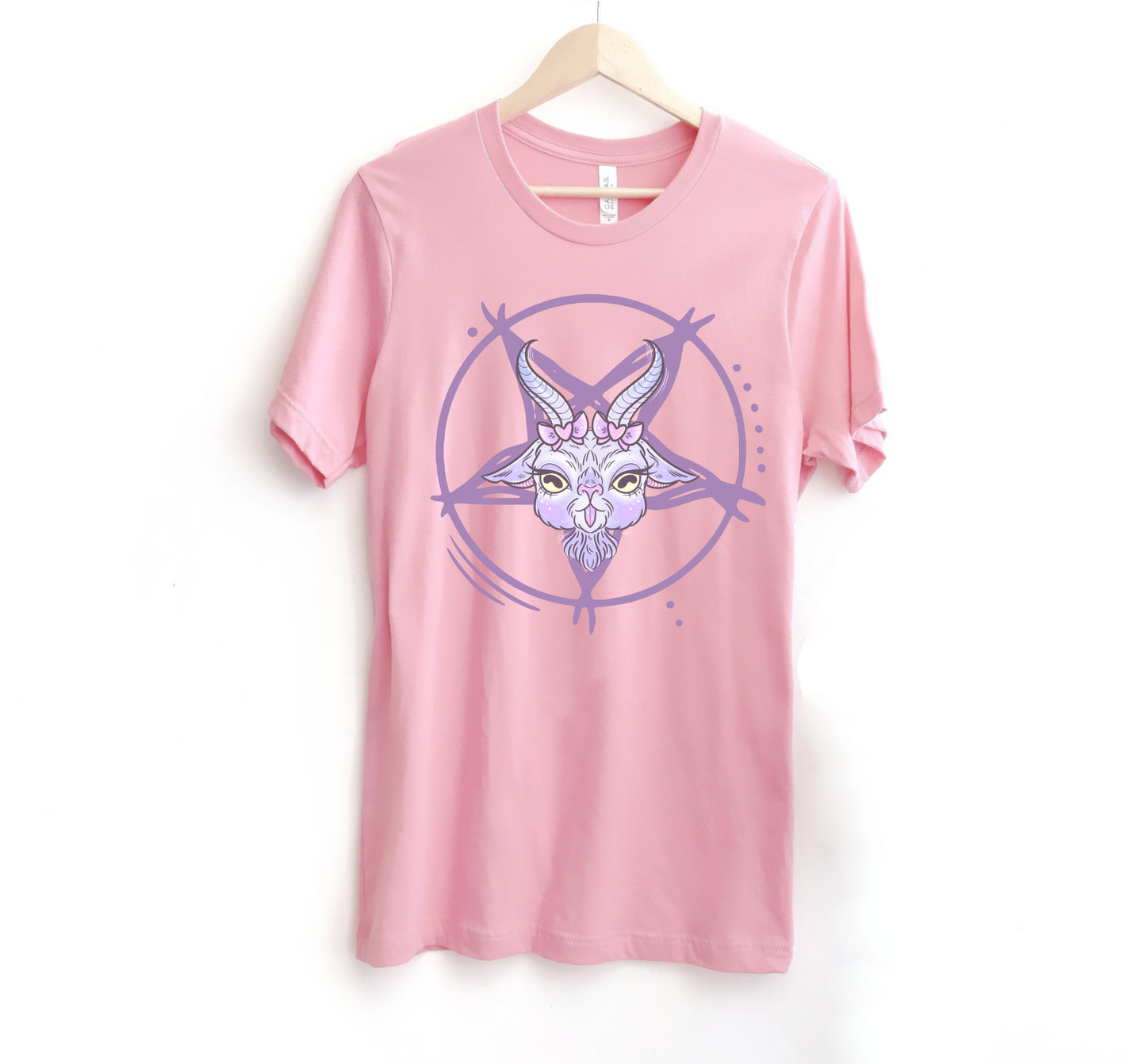 Pastel goth tee with goat on white background.