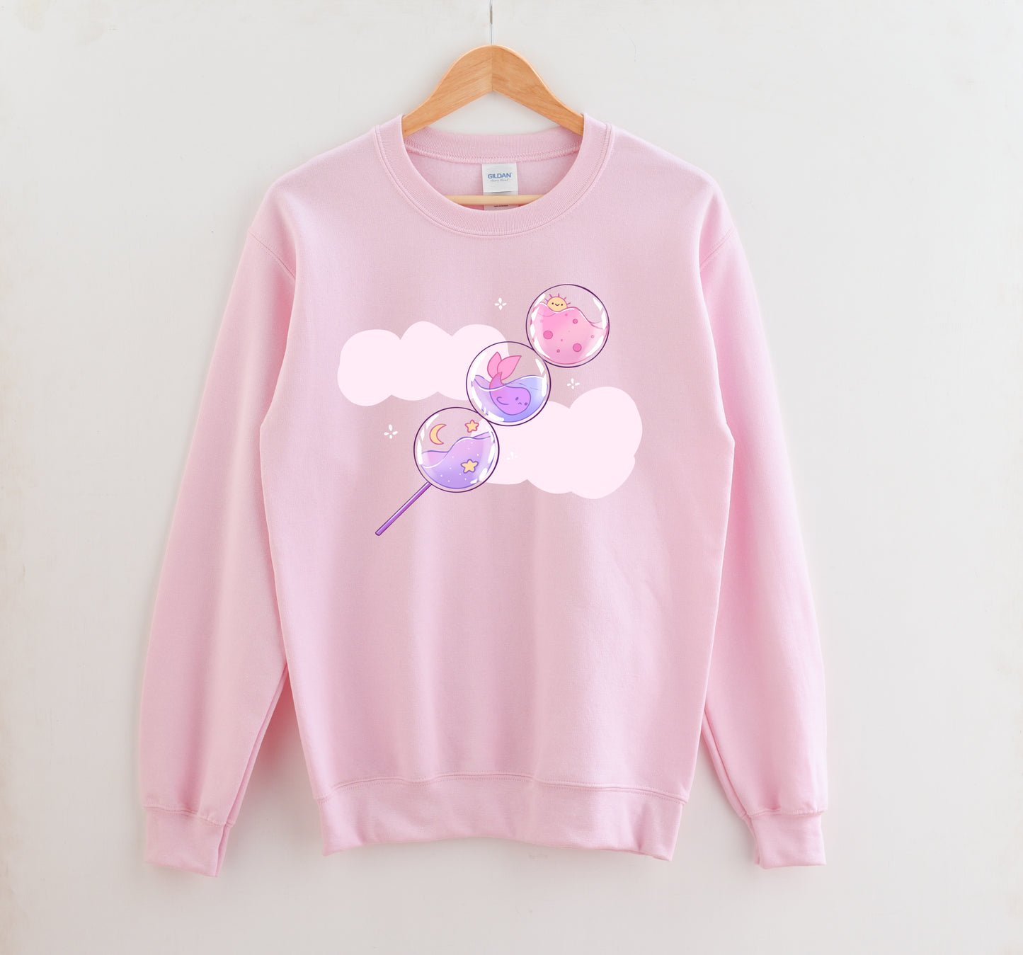 Pink cute candy pastel sweatshirt in a white background