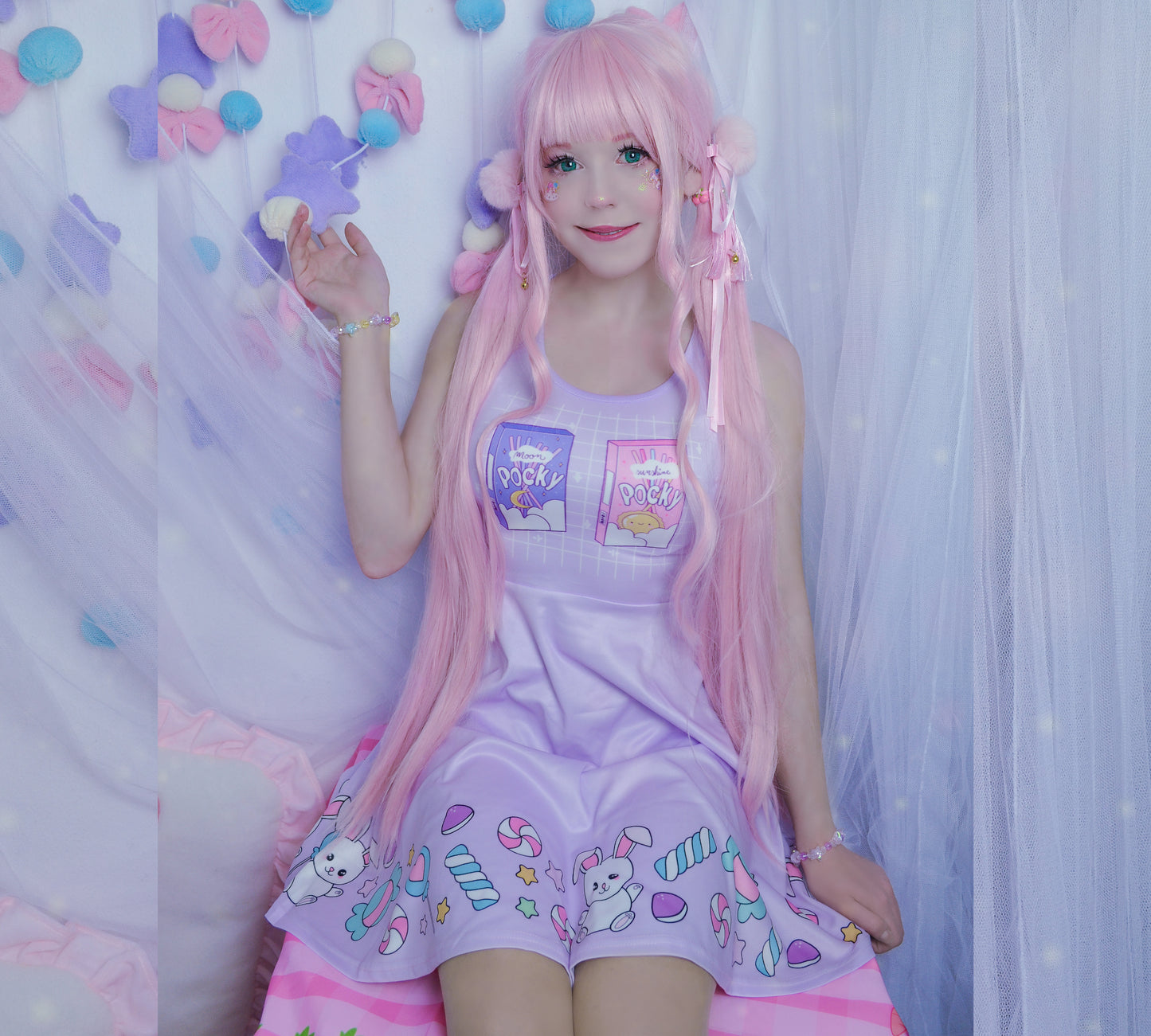 young model wearing a cute Pocky Kawaii Skater dress with candies