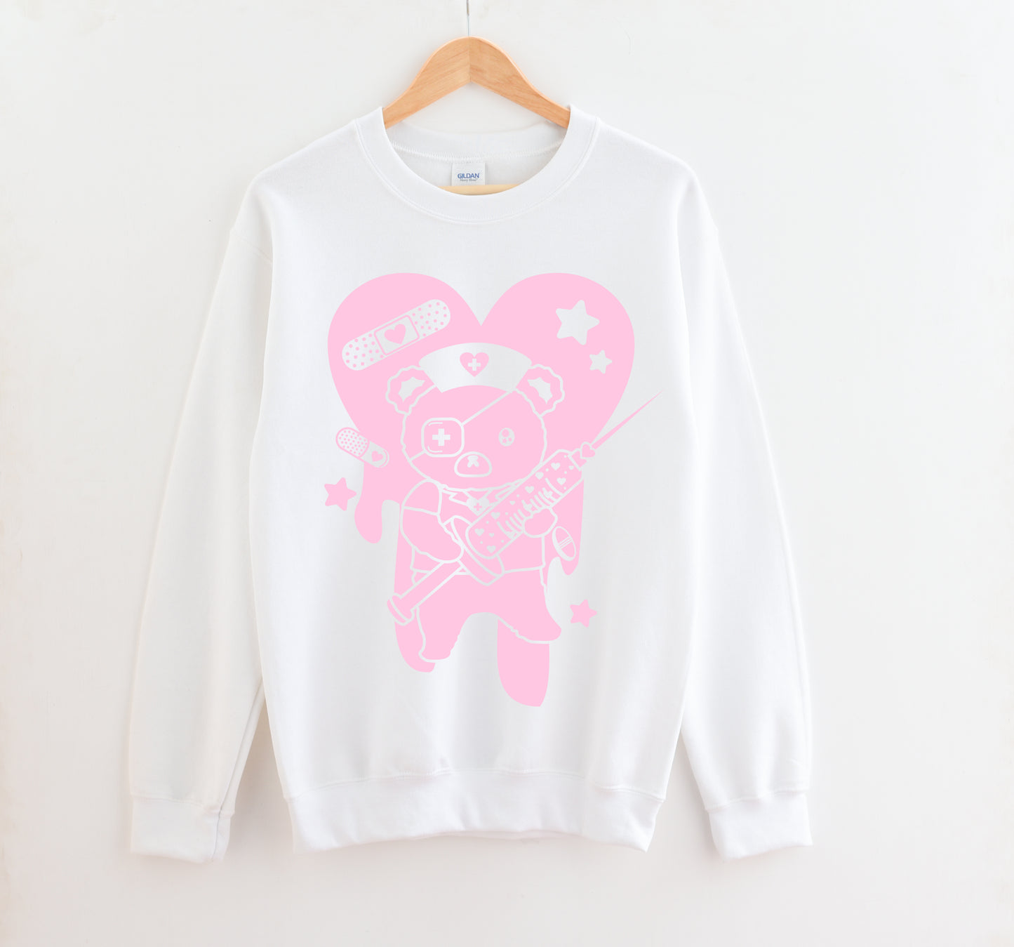 White Menhera Kei Bear Band Aid kawaii aesthetic sweatshirt displayed on clean background.