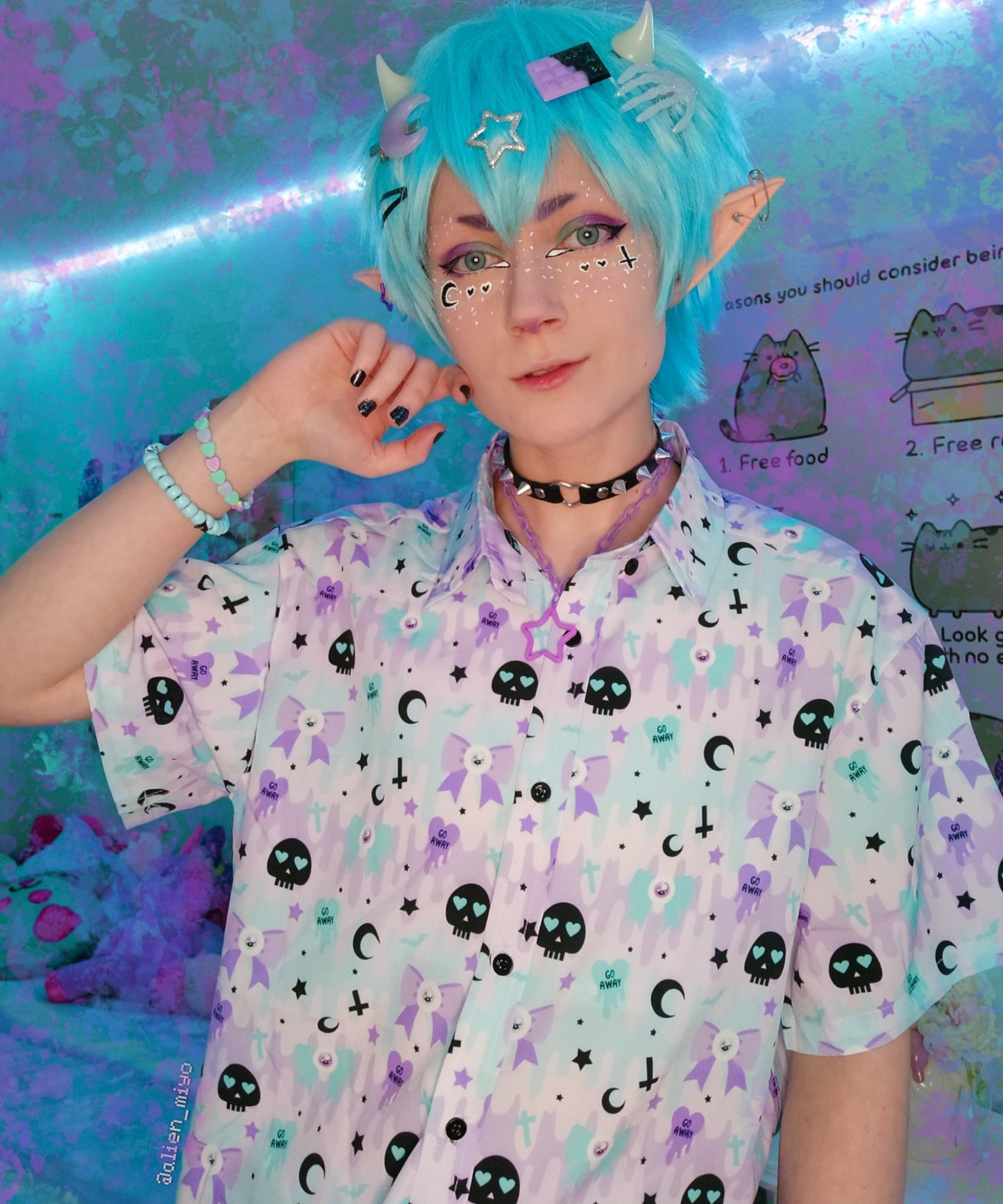 Youth model wearing a kawaii pastel goth shirt with skulls