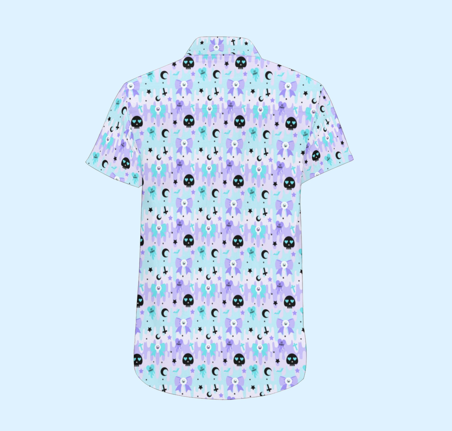 Pastel goth shirt with skull print on coloured background.