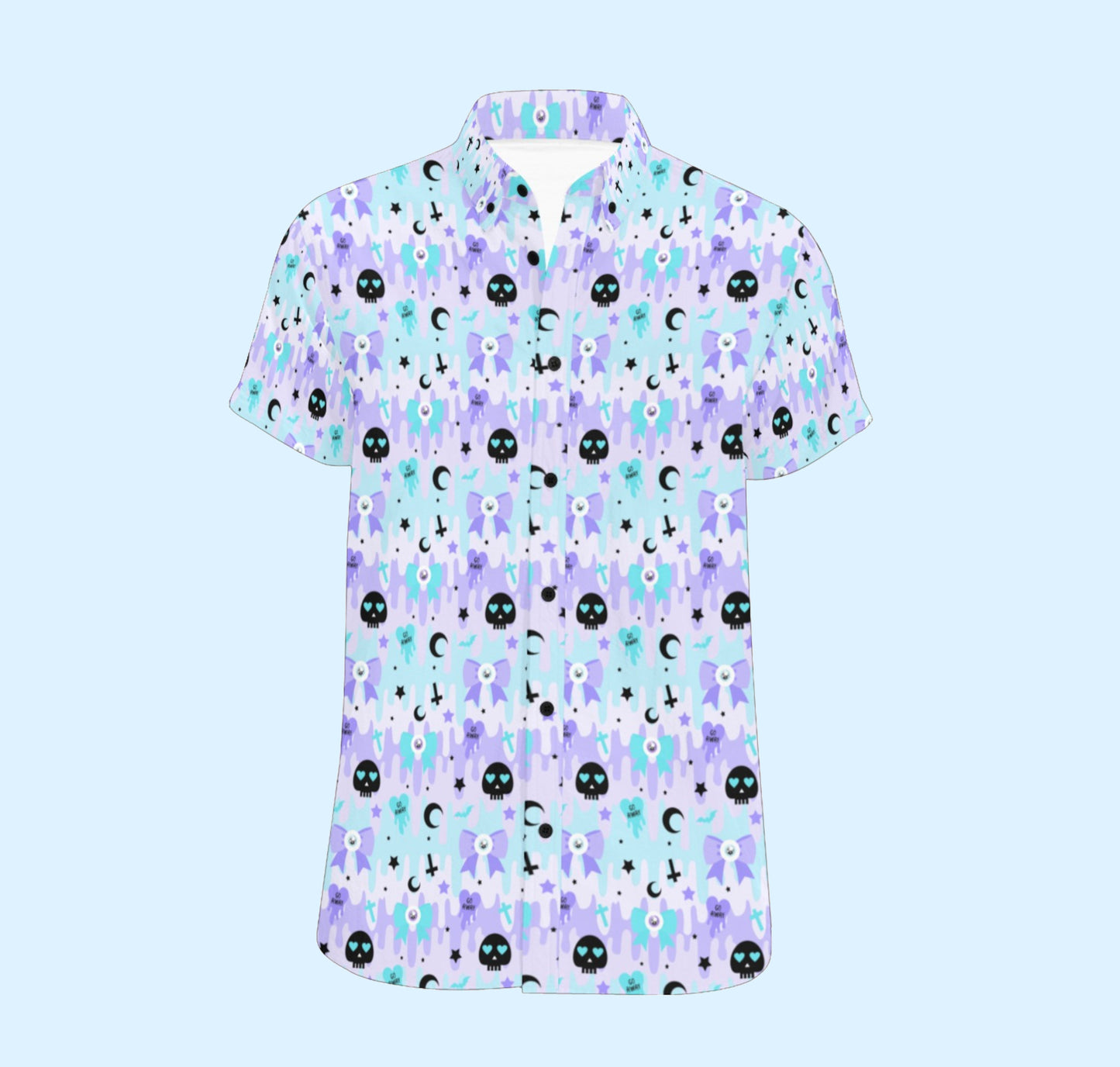 Pastel goth shirt with skull print on coloured background.