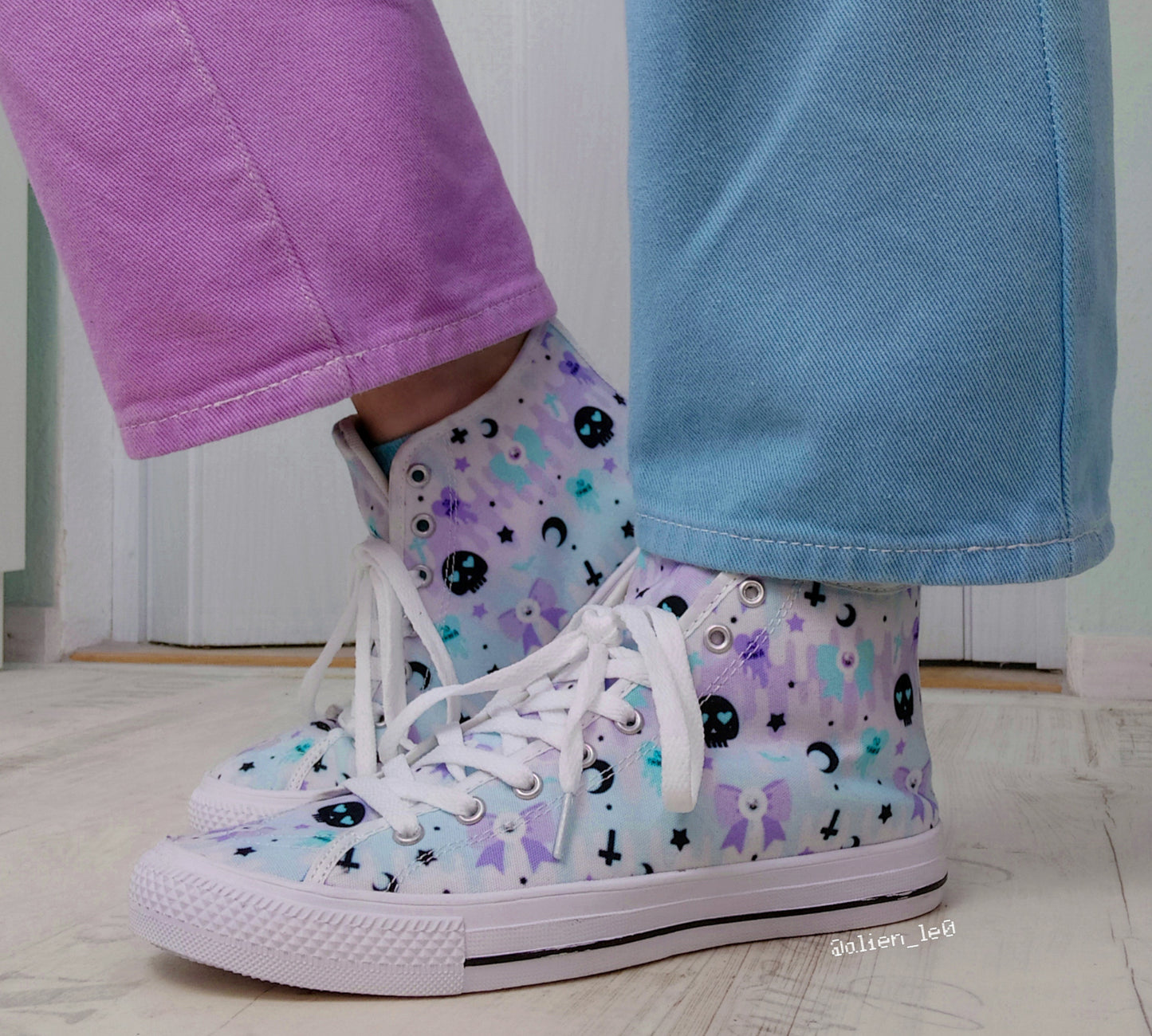 Model wearing stylish, cute shoes with a playful design