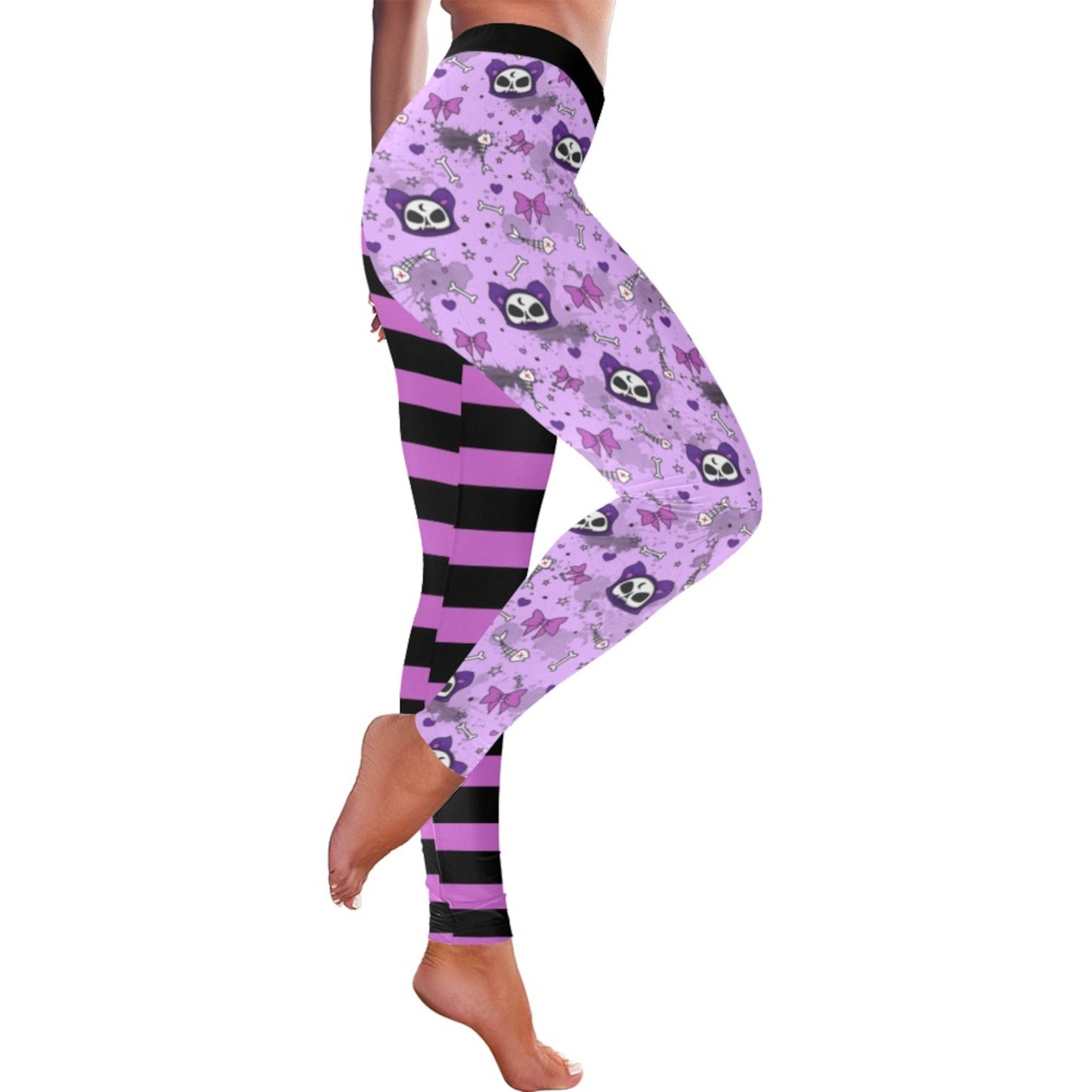 Purple and black pastel goth leggings displayed on clean white background
