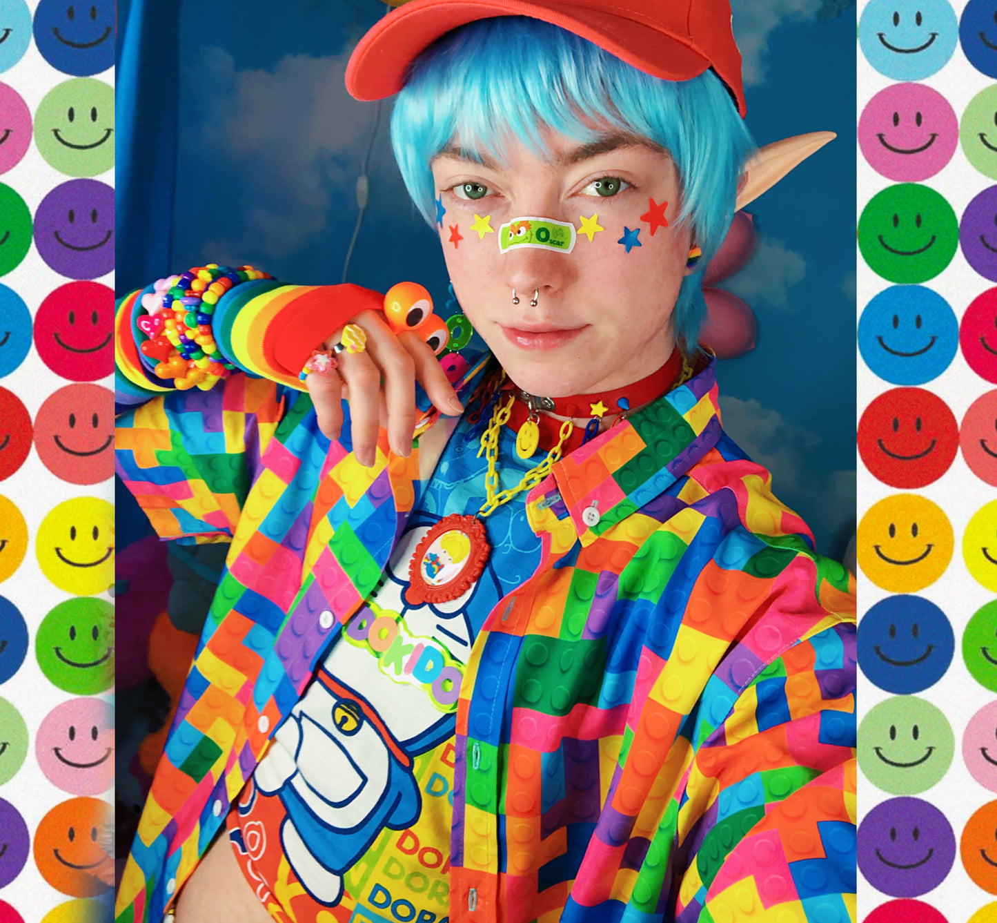 Youthful model wearing a cute harajuku shirt with rainbow accessories