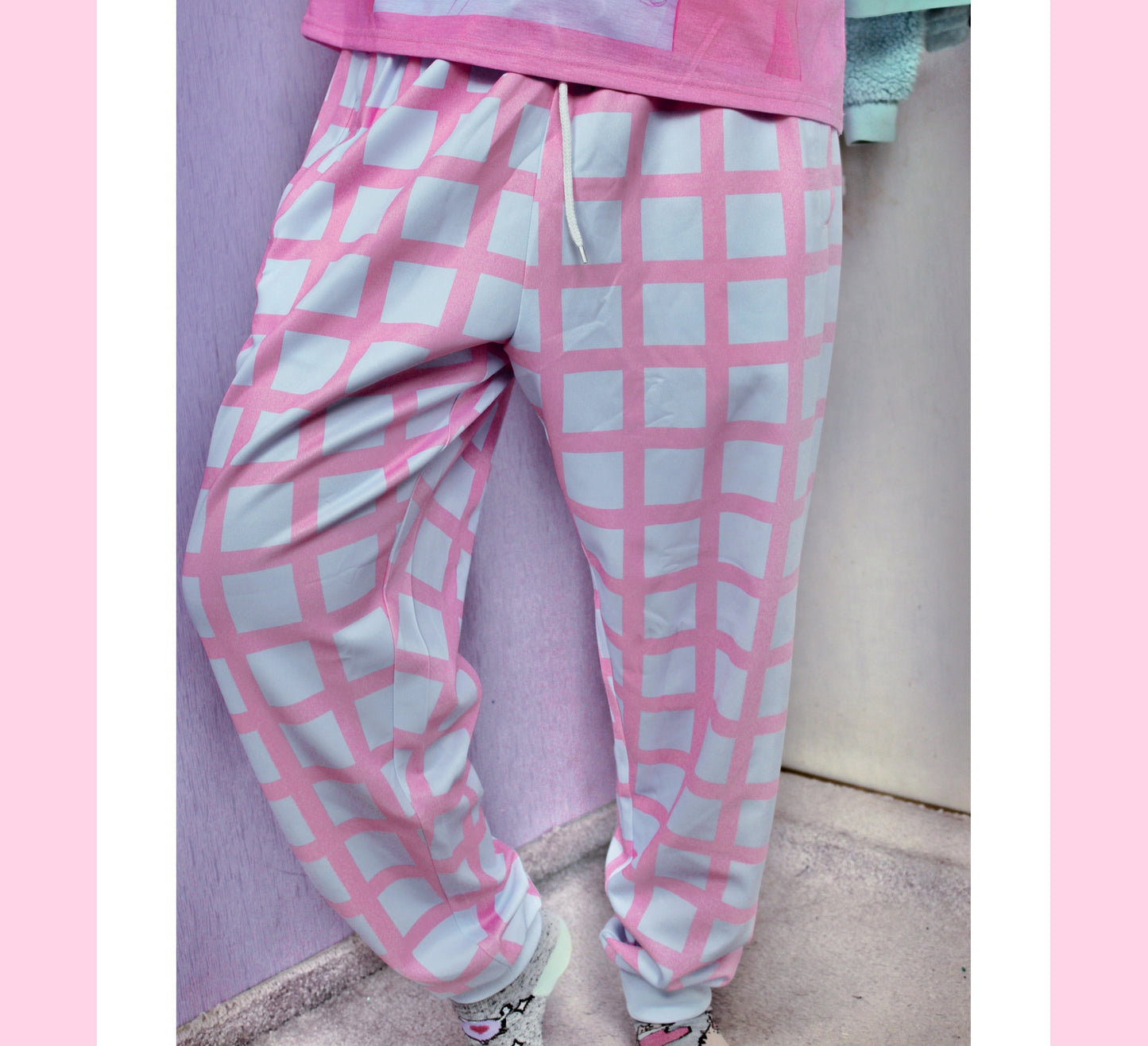 model wearing Yume Kawaii Checkered Pastel Unisex Jogger Pants