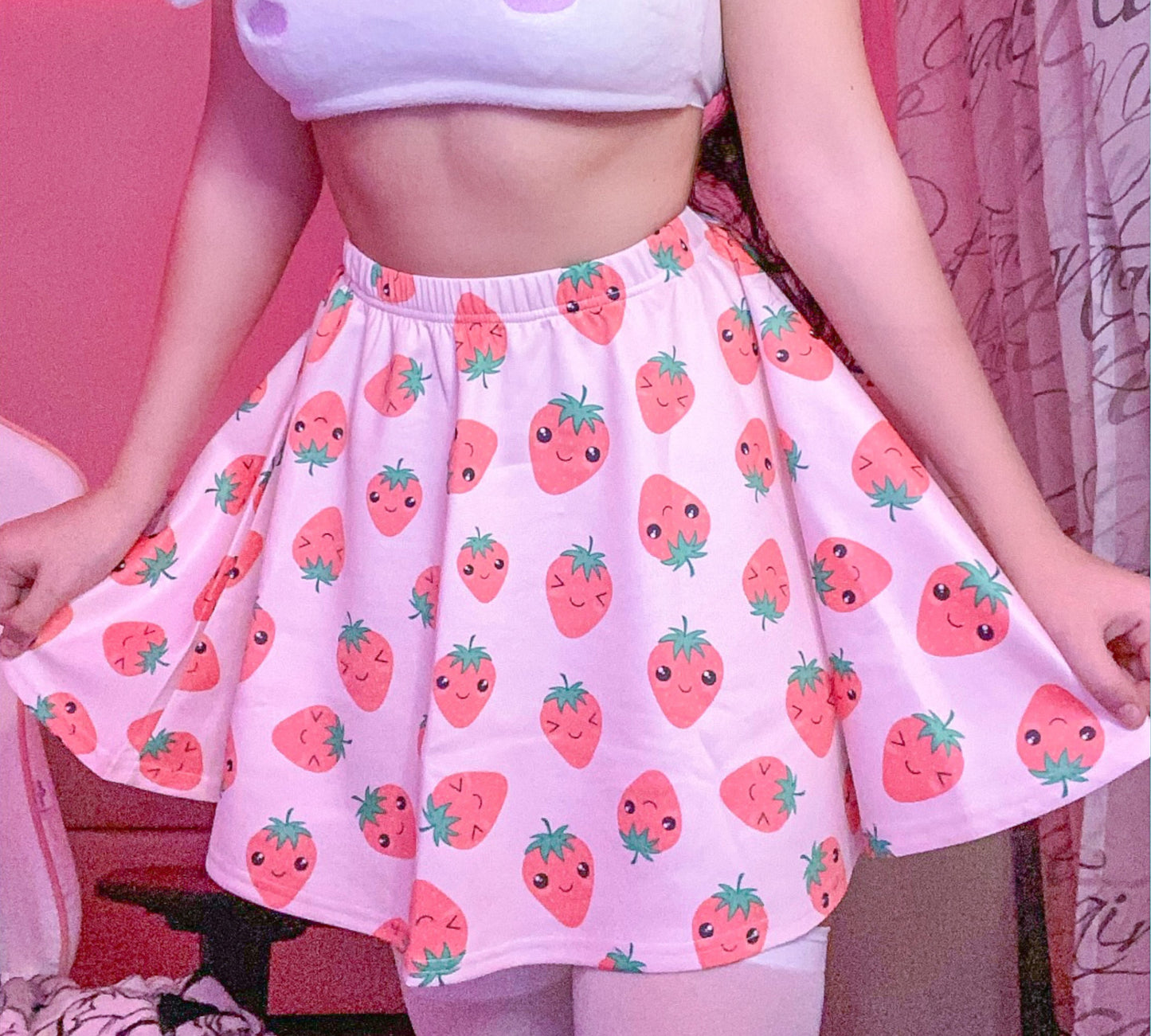 Youthful model wearing a cute Yume Kawaii Fairy Kei Pastel Pink Strawberry Skirt