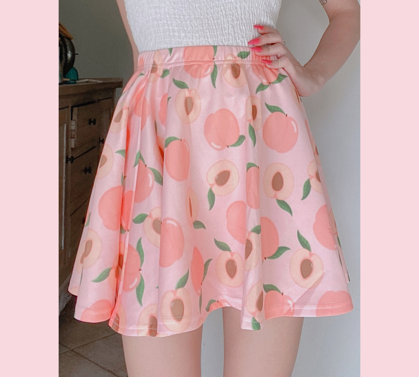 Young girl wearing a pastel kawaii skirt with a cute print