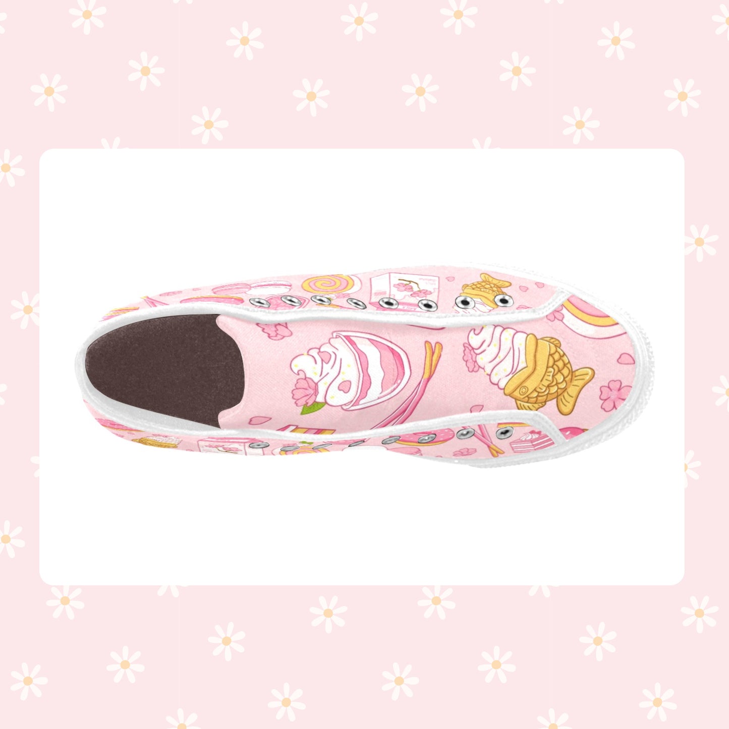 Close-up of cute pastel-colored shoes with decorative elements, displayed on a smooth white surface