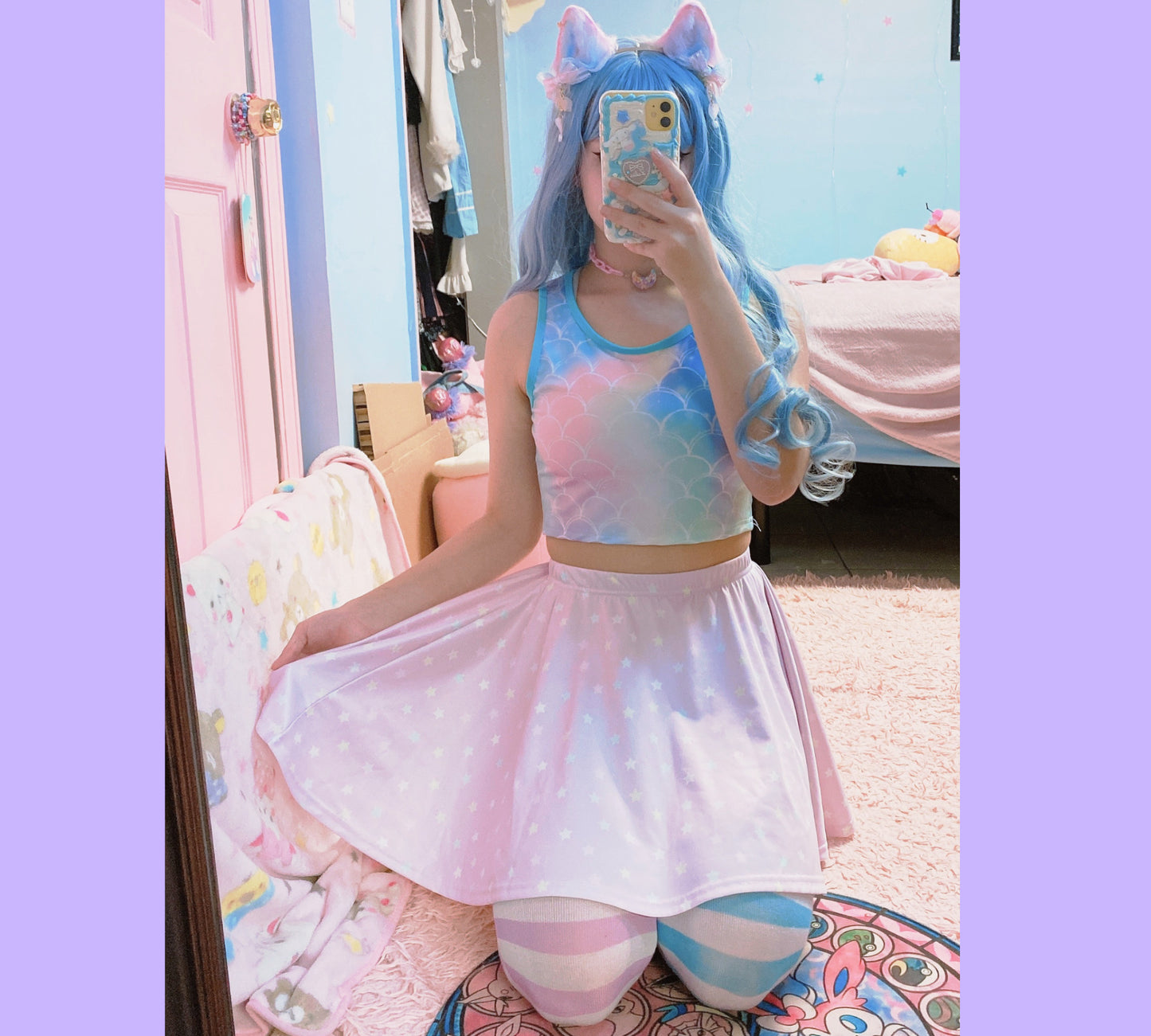 Youthful model wearing a cute Yume Kawaii Skater Stars Skirt with mermaid top