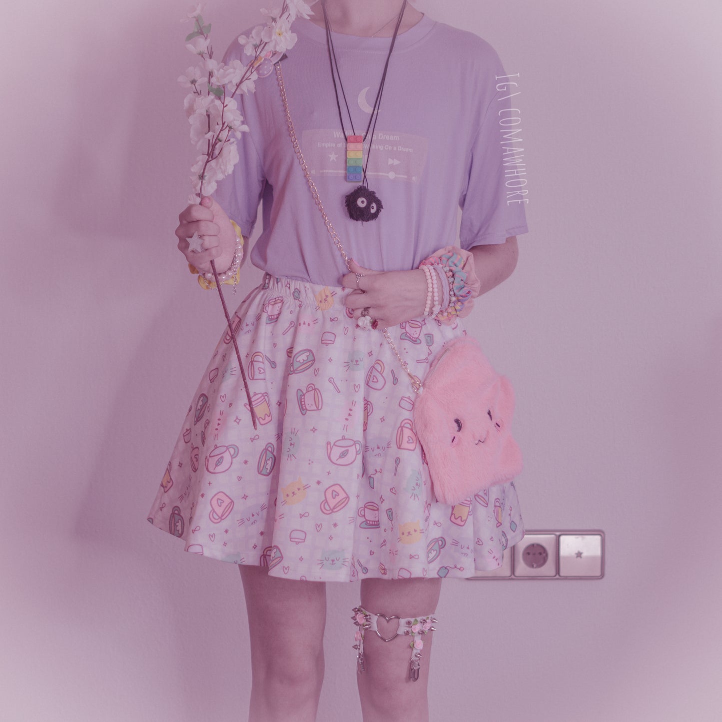 girl modeling a kawaii aesthetic t-shirt featuring playful, pastel artwork