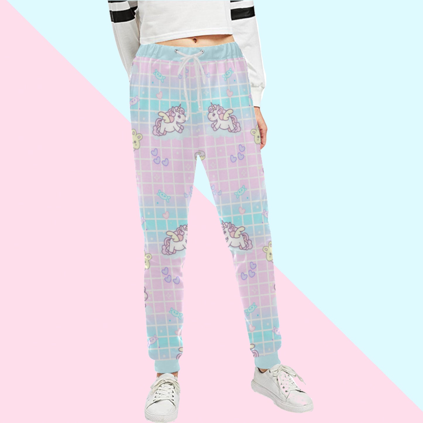 Yume Kawaii Unicorn Jogger Pants Fairy Kei jogger pants displayed on pastel background.