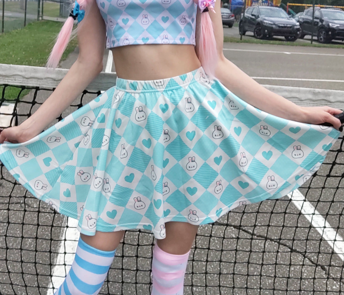 Young girl wearing a pastel kawaii skirt with a cute print