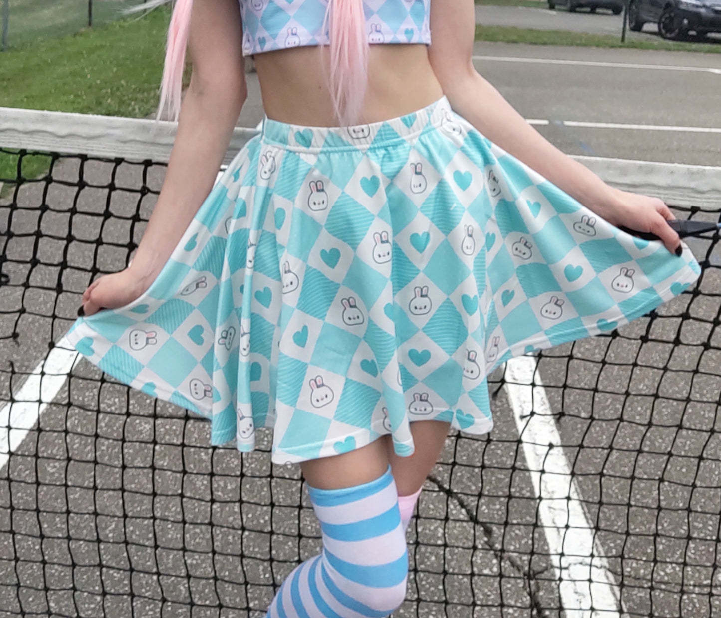 Young girl wearing a pastel kawaii skirt with a cute print