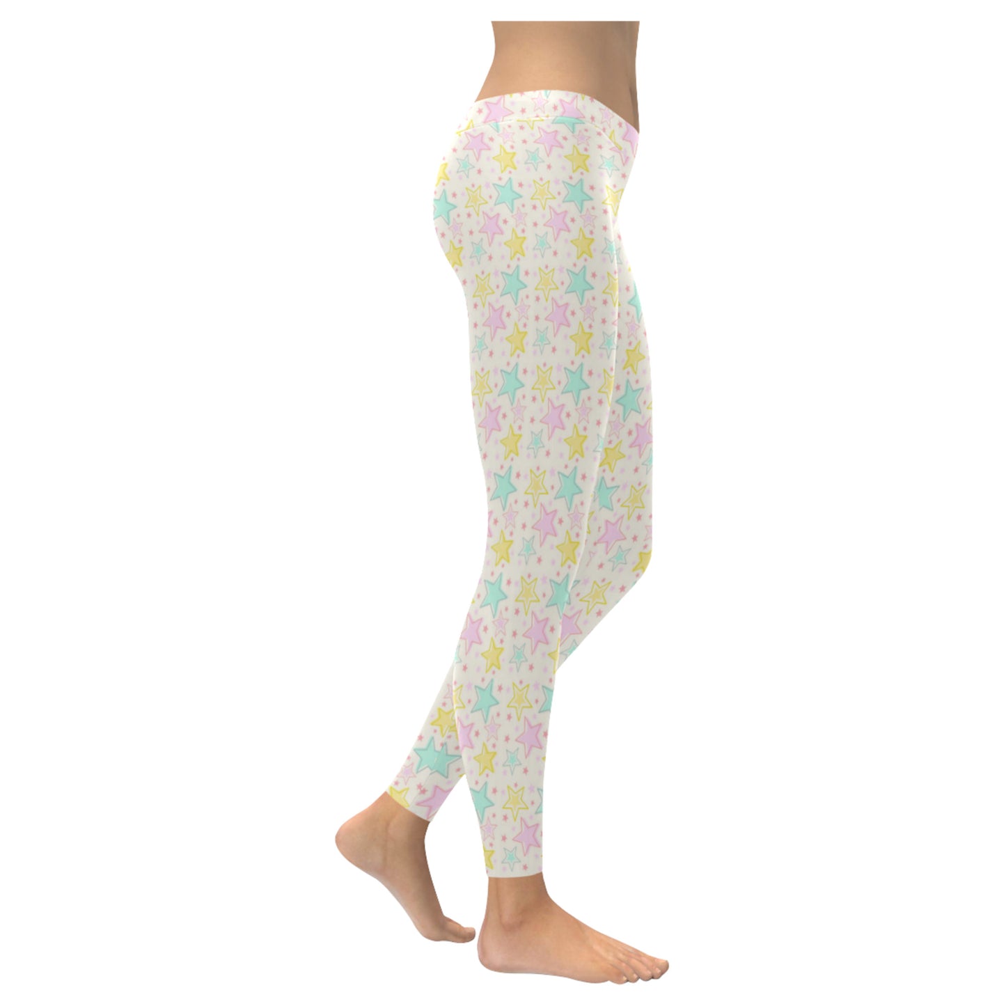 Youthful model wearing cute Yume Kawaii star leggings in pastel colours on white background