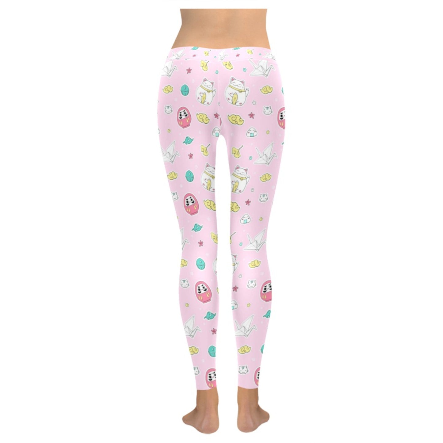 Pink pastel kawaii leggings displayed on clean white background.