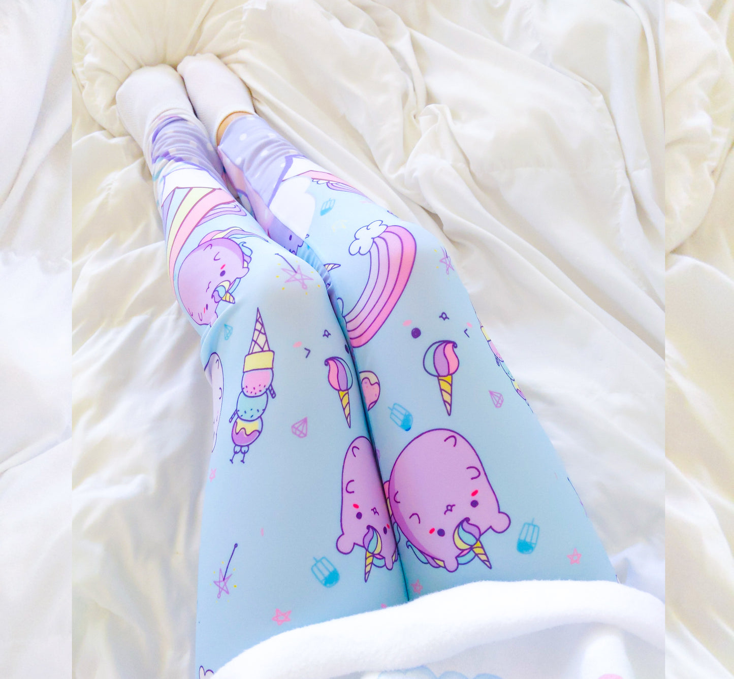 Youthful model wearing cute yume kawaii rainbow cloud cat leggings