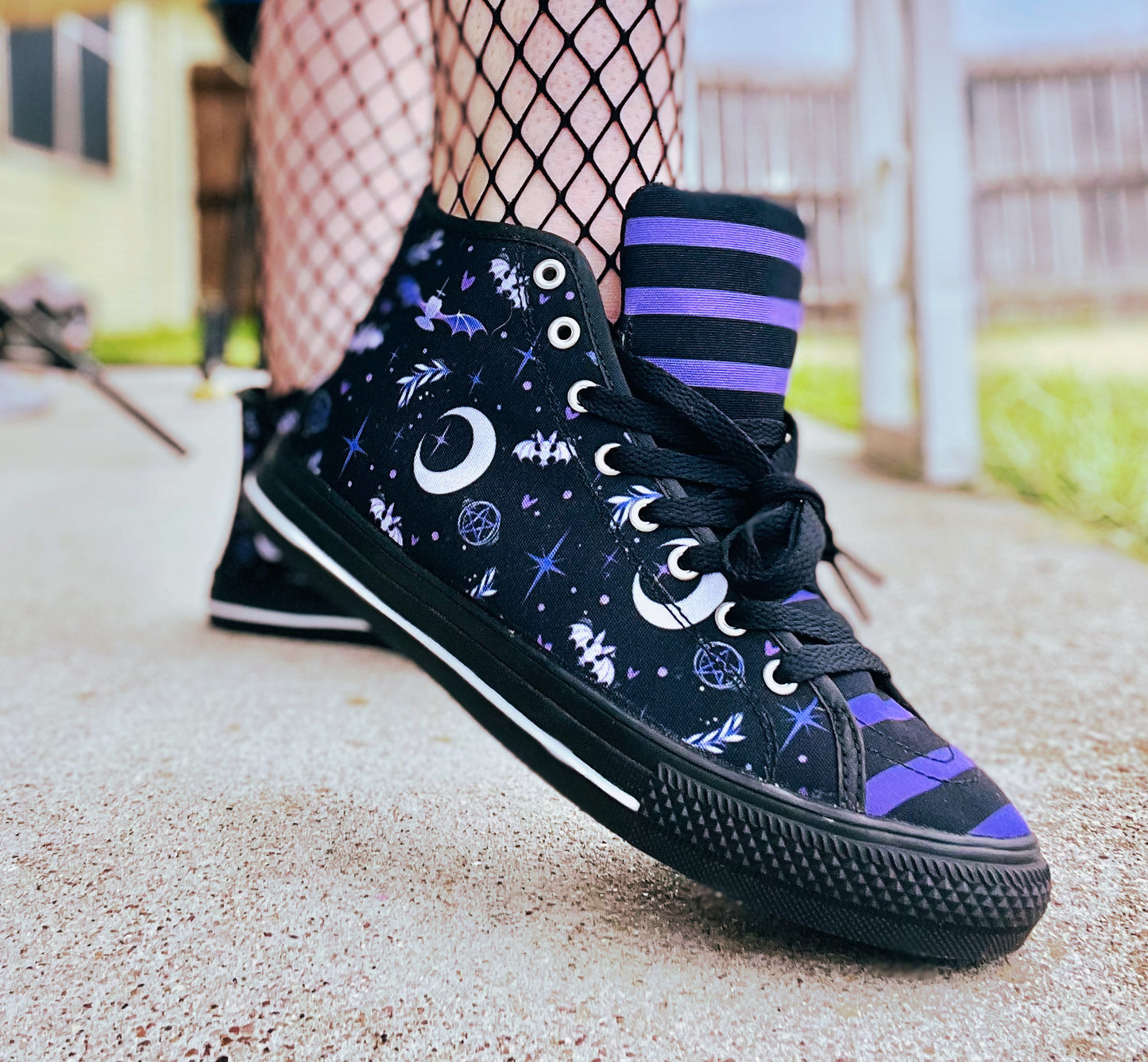 Young girl wearing stylish, cute shoes with a playful design