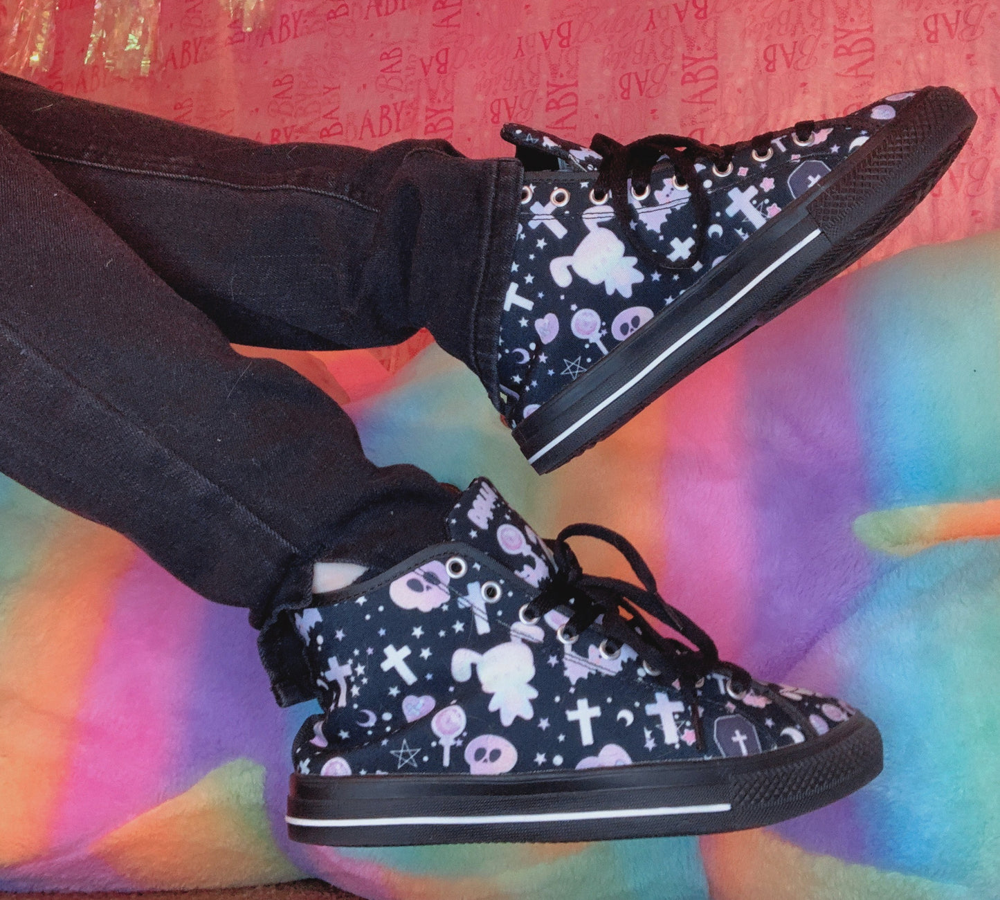 Young girl wearing stylish, cute pastel goth bunny shoes