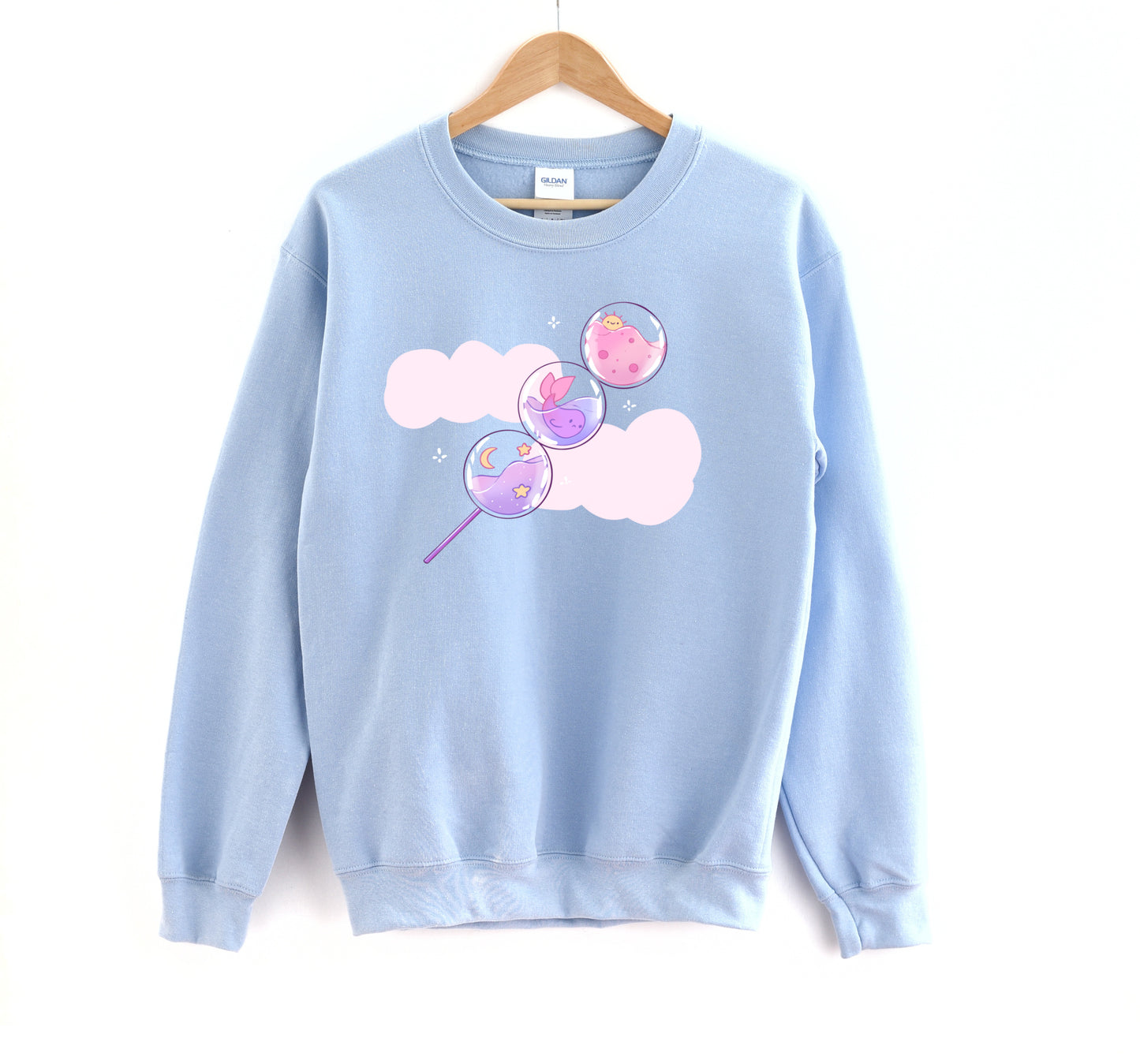 Blue cute candy pastel sweatshirt in a white background