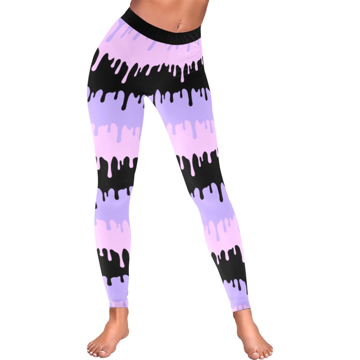 Pink and black pastel goth leggings displayed on clean white background