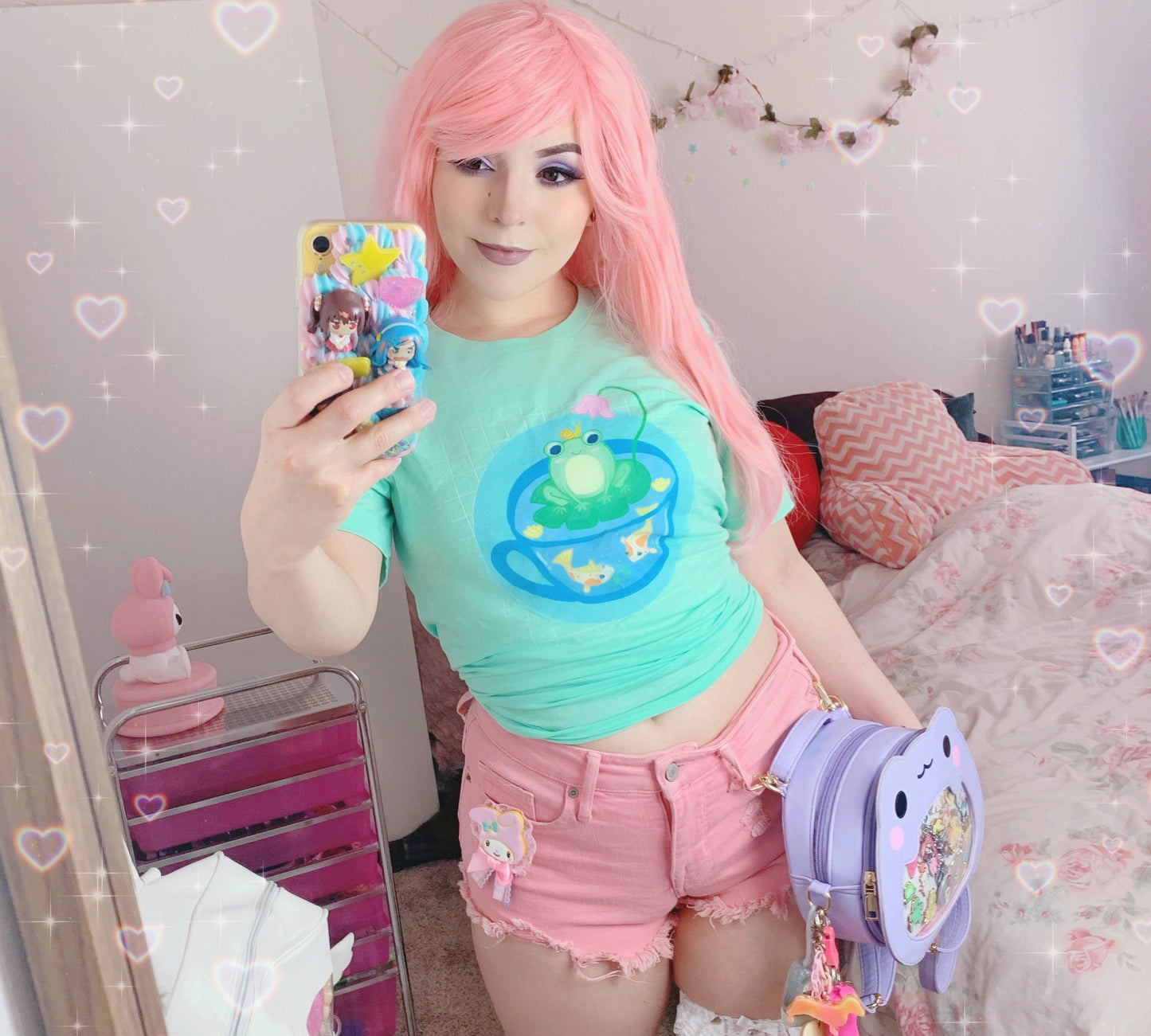 Kawaii frog t-shirt with pastel colors and cute anime-style design.