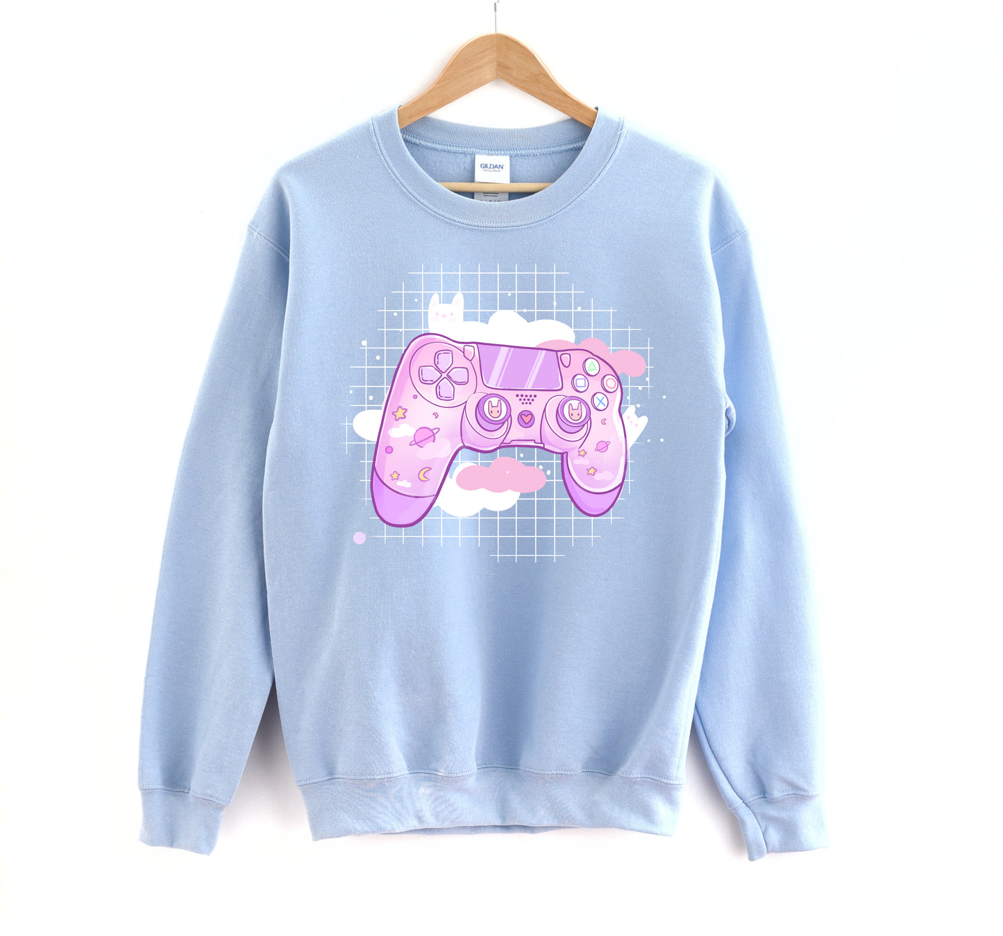 Blue pastel kawaii sweatshirt displayed on clean white background.