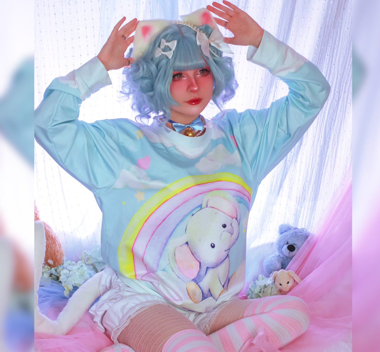 Youthful model wearing a Enchanted Fairy Kei Yume Kawaii Elephant Sweatshirt